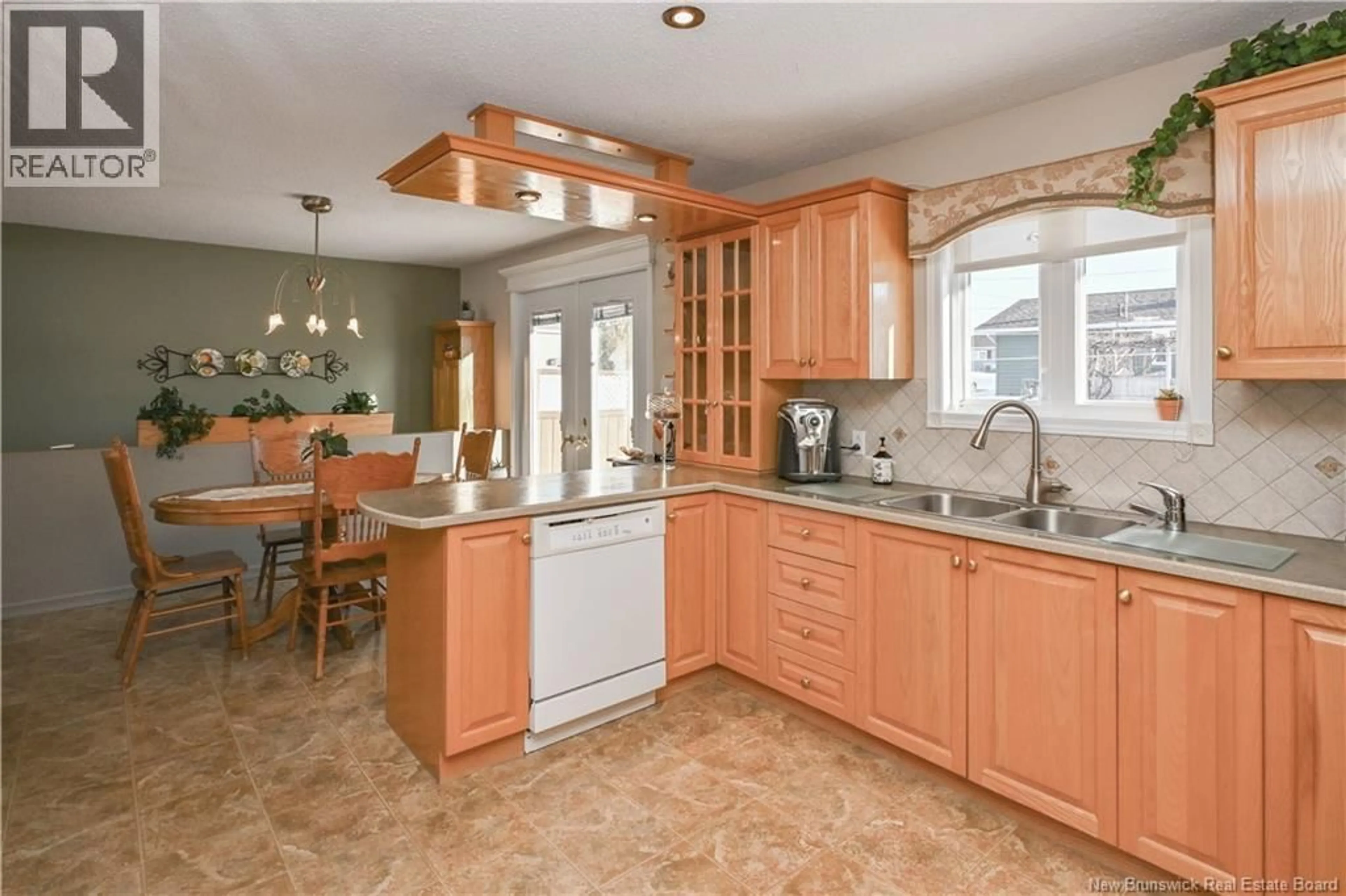 Open concept kitchen, ceramic/tile floor for 262 SAVARD STREET, Caraquet New Brunswick E1W1A4