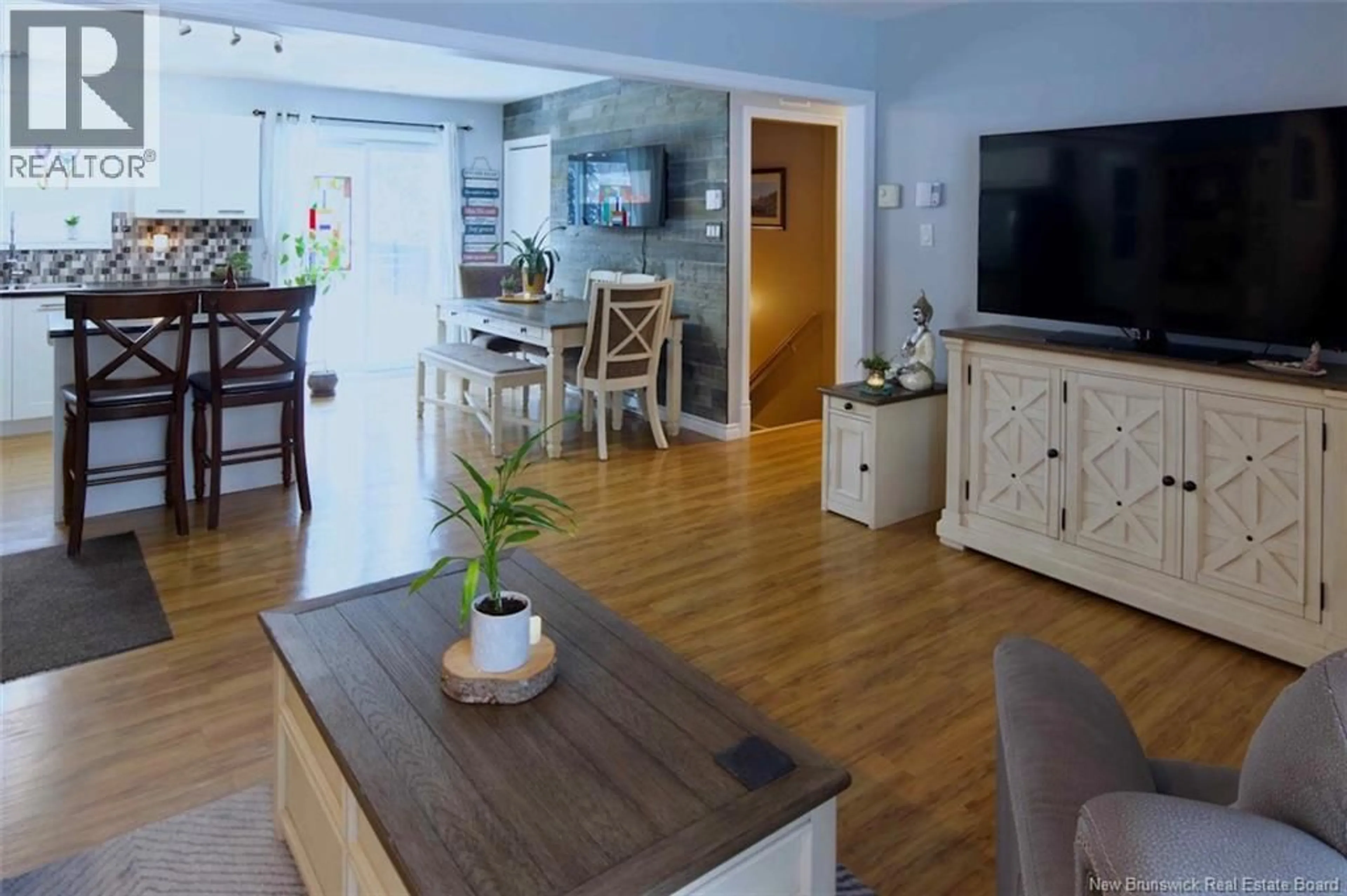 Living room with furniture, wood/laminate floor for 174 RICEVILLE ROAD, Edmundston New Brunswick E3V4S8