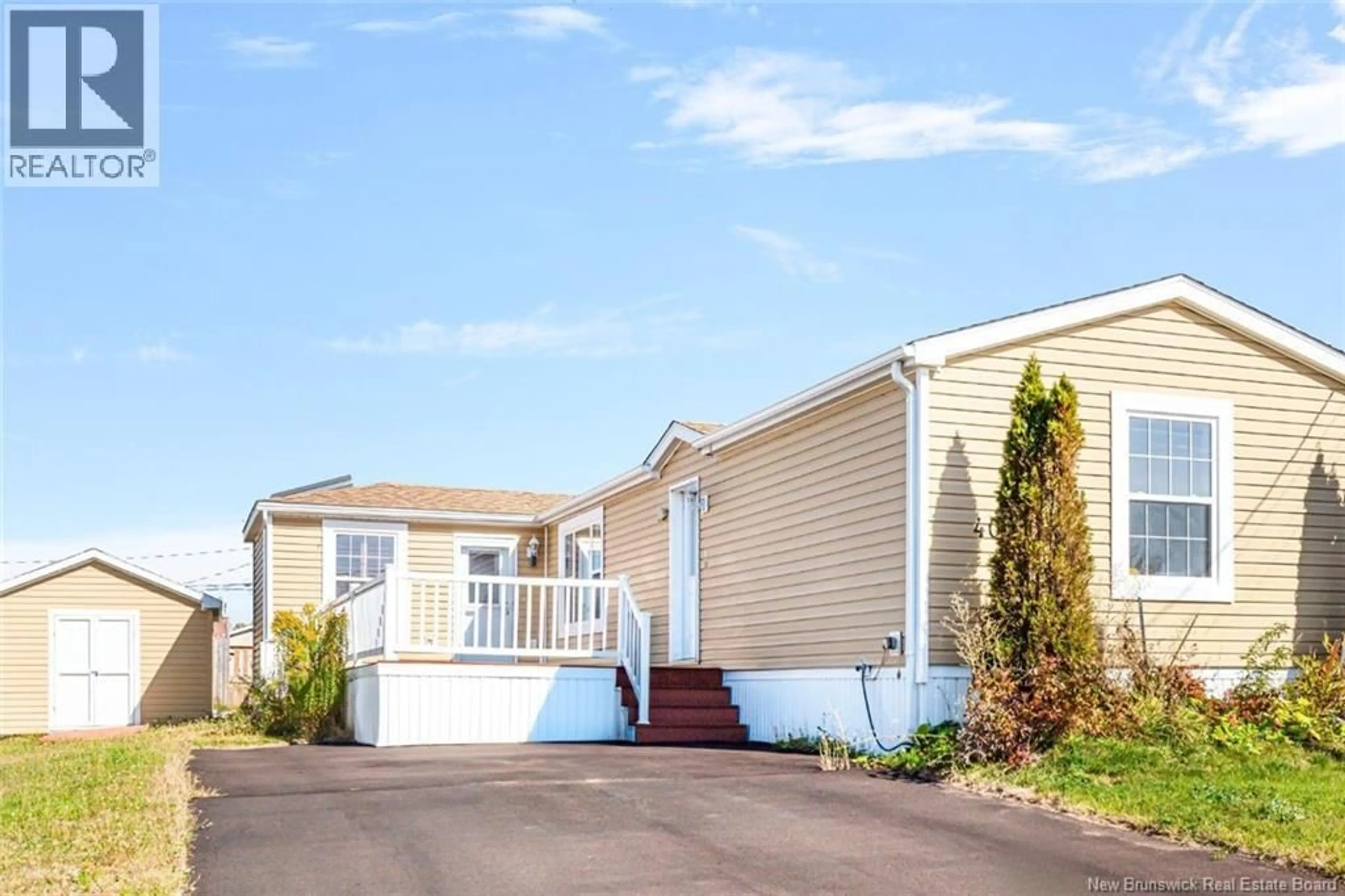 Home with vinyl exterior material, street for 40 POLLETT LANE, Dieppe New Brunswick E1A9P6