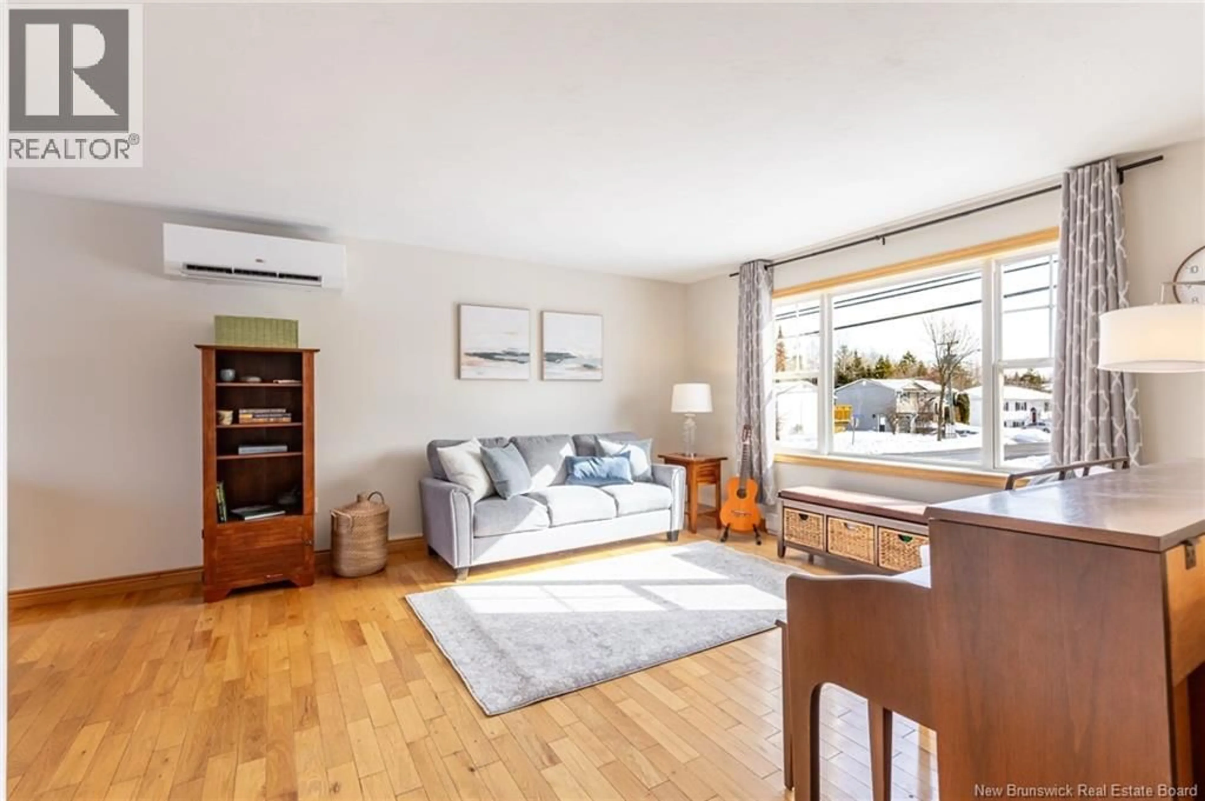 Living room with furniture, wood/laminate floor for 135 GOODINE STREET, Fredericton New Brunswick E3B7J7