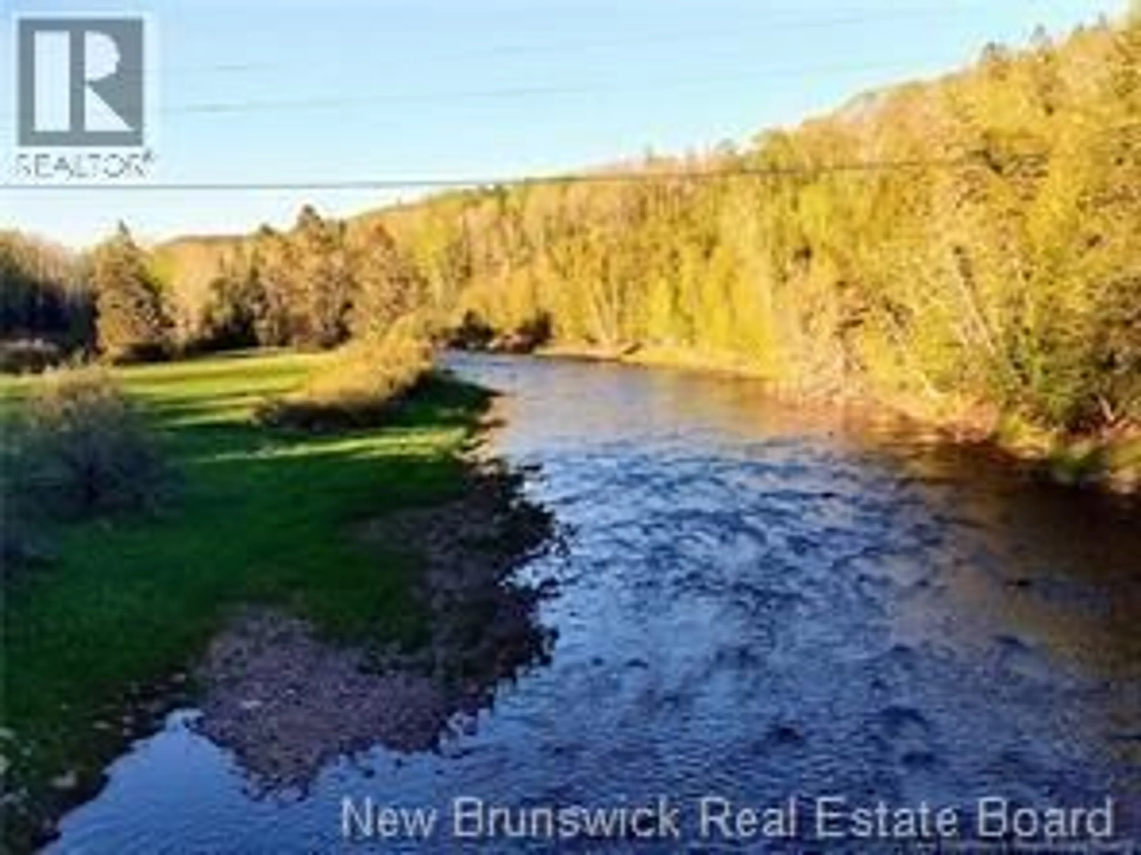 A pic from outside/outdoor area/front of a property/back of a property/a pic from drone, water/lake/river/ocean view for 53 BACK RIVER ROAD, Barnesville New Brunswick E5N3M9