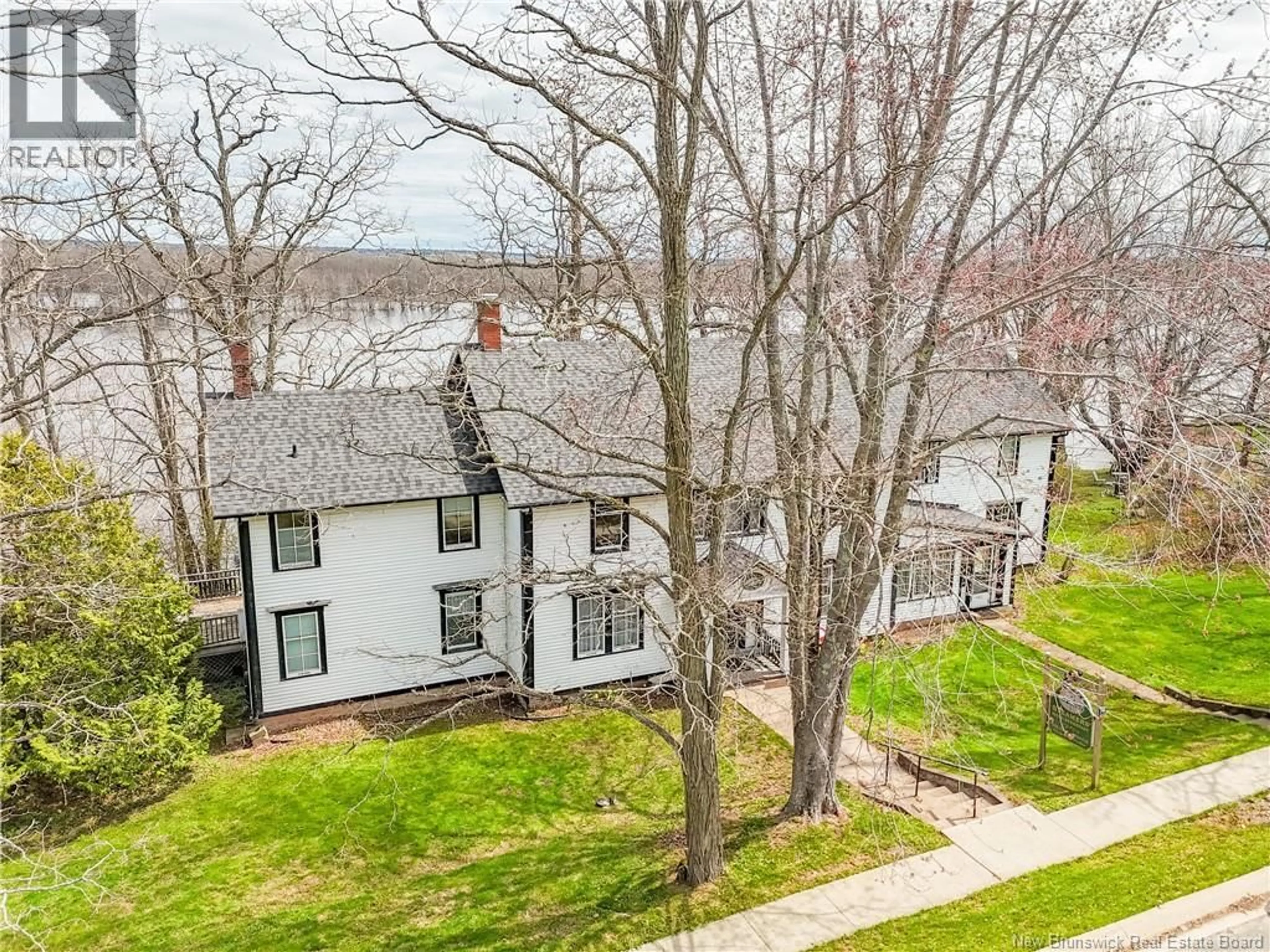 A pic from outside/outdoor area/front of a property/back of a property/a pic from drone, water/lake/river/ocean view for 74 FRONT STREET, Gagetown New Brunswick E5M1A1
