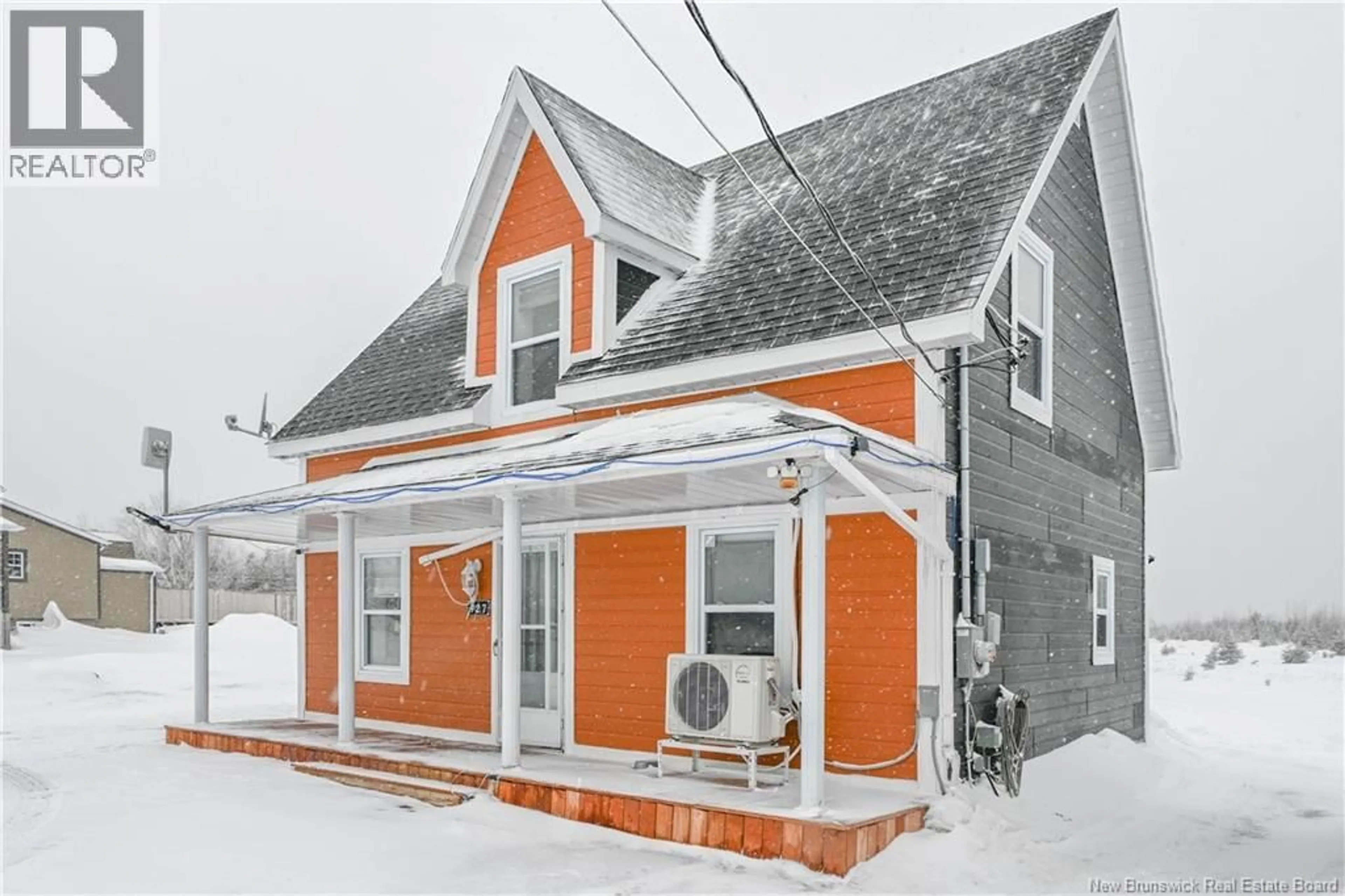 Home with vinyl exterior material, street for 927 PAQUETVILLE ROAD, Paquetville New Brunswick E8R1E7