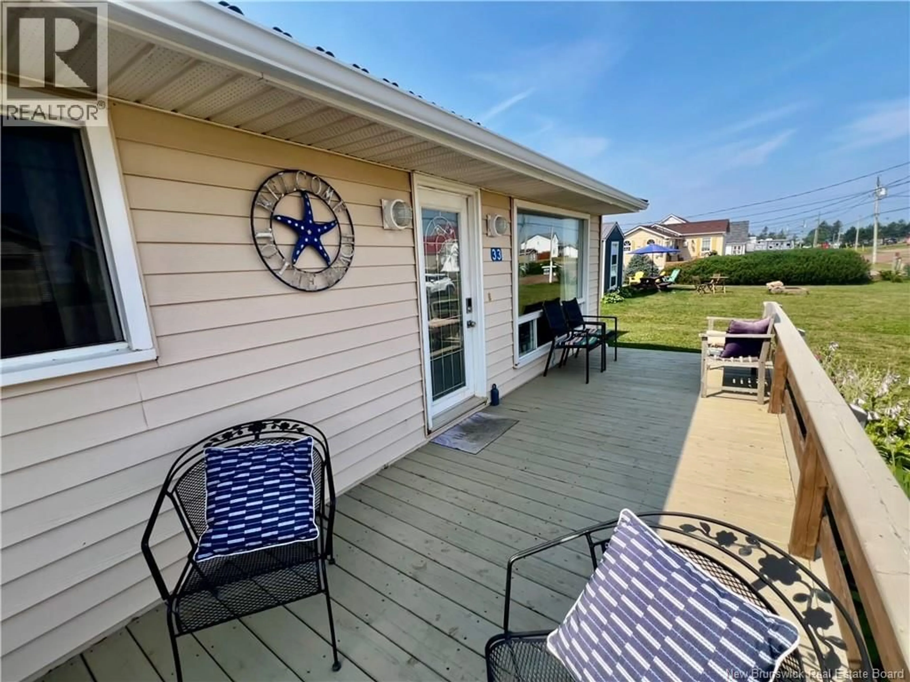 Patio, water/lake/river/ocean view for 33 SUR L'OCEAN, Grand-Barachois New Brunswick E4P8P1