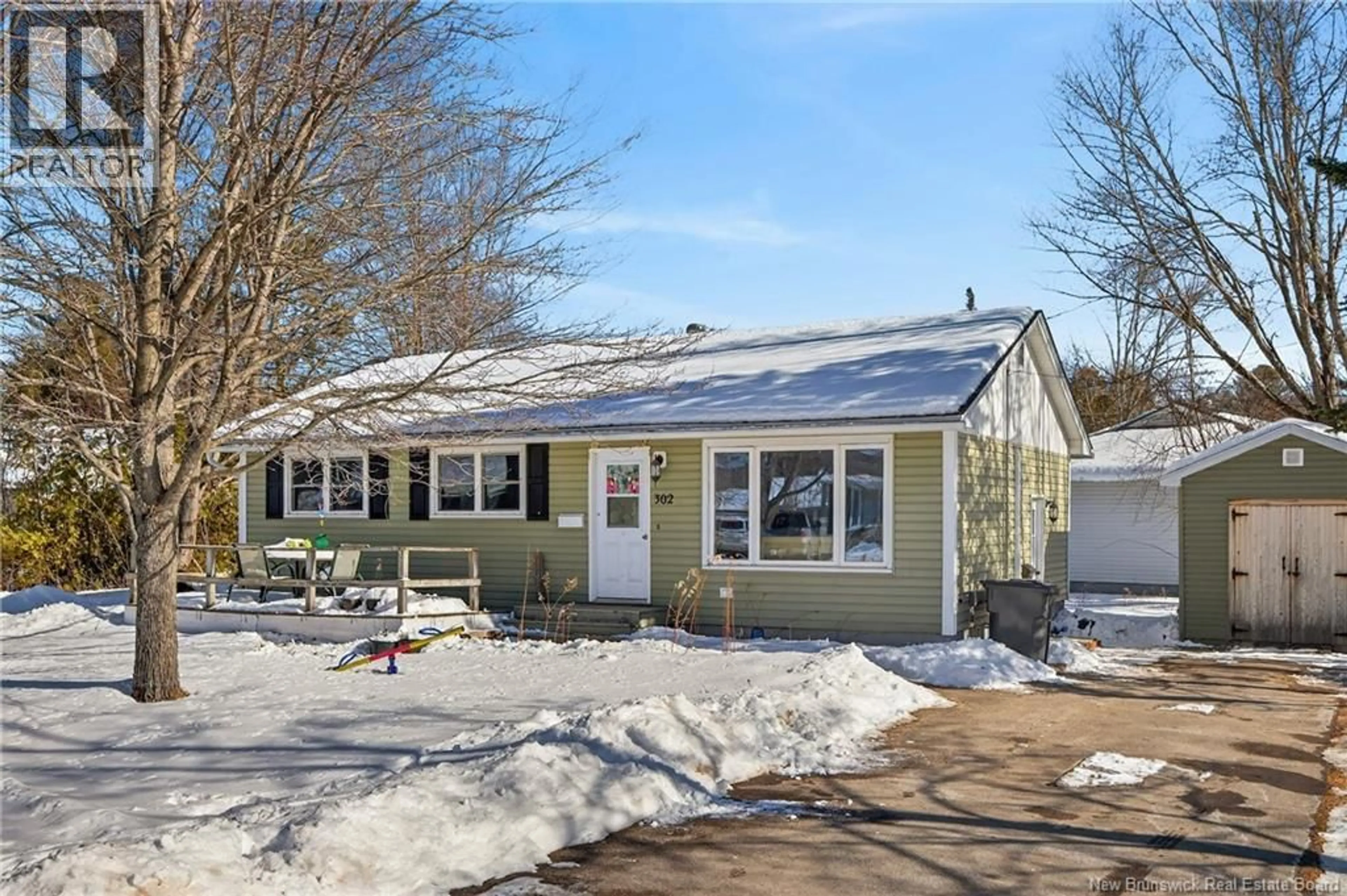 Home with vinyl exterior material, street for 302 FULTON AVENUE, Fredericton New Brunswick E3A2C2