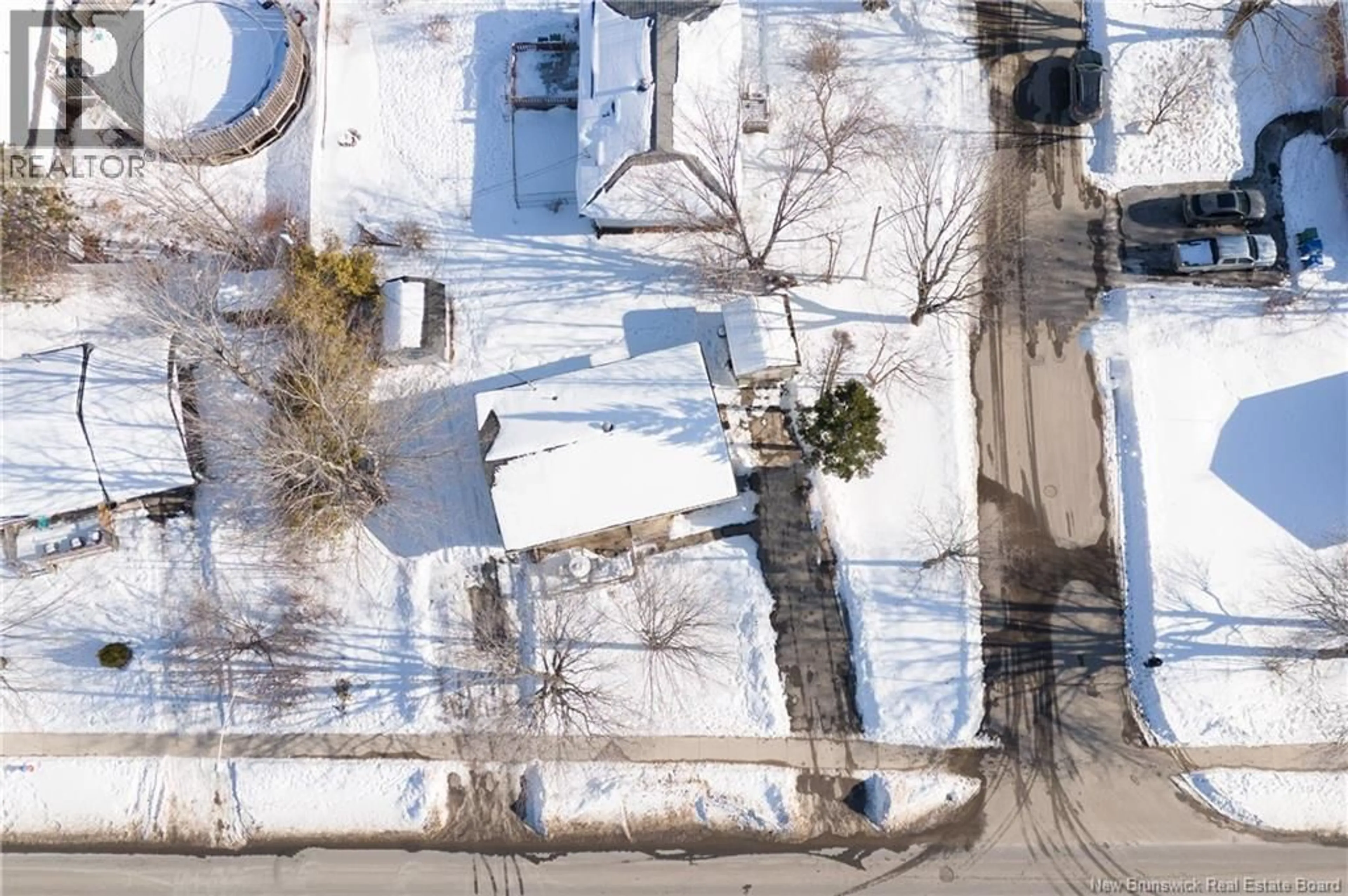 A pic from outside/outdoor area/front of a property/back of a property/a pic from drone, street for 302 FULTON AVENUE, Fredericton New Brunswick E3A2C2