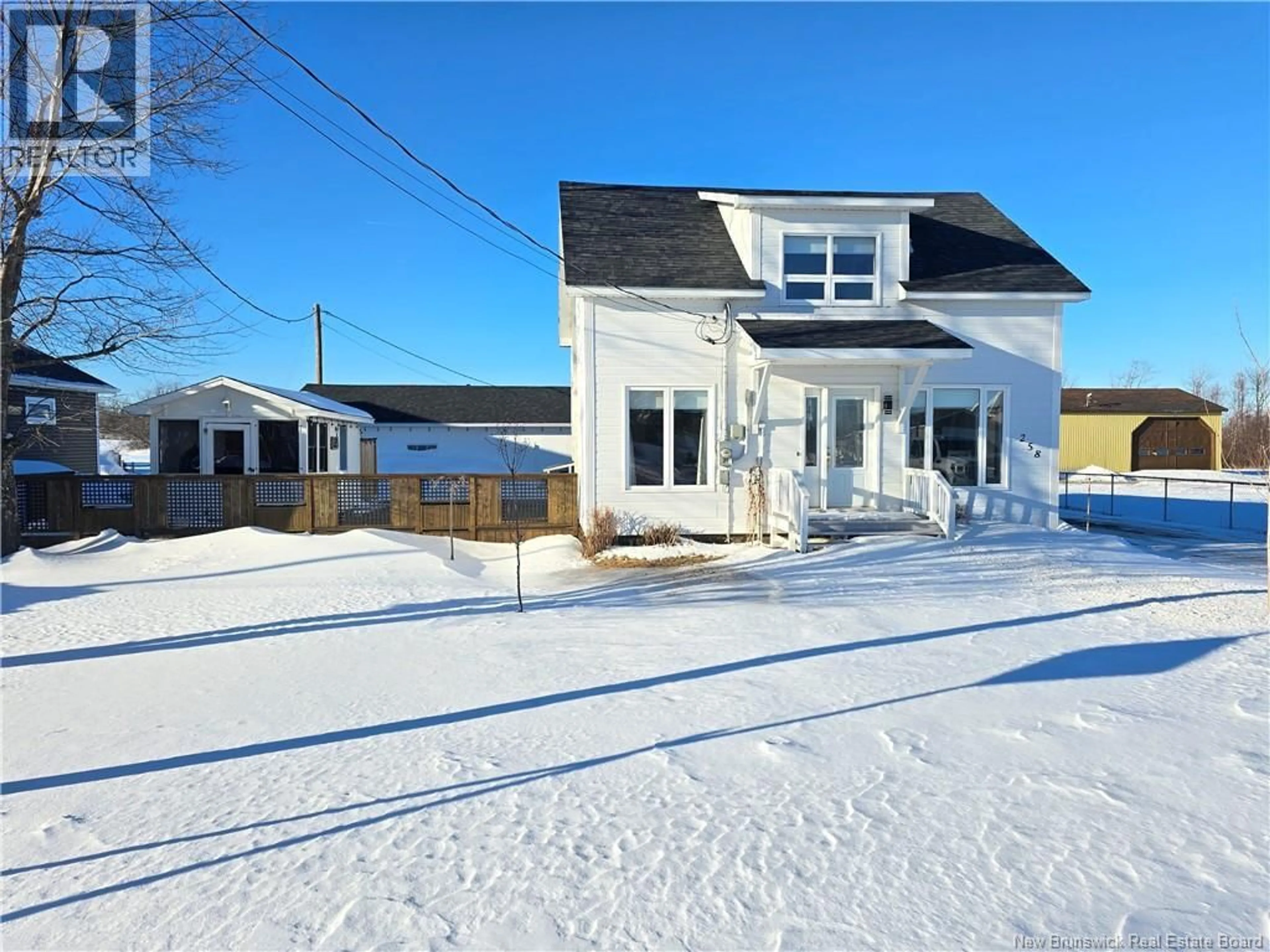 A pic from outside/outdoor area/front of a property/back of a property/a pic from drone, street for 258 PARC, Beresford New Brunswick E8K2E8