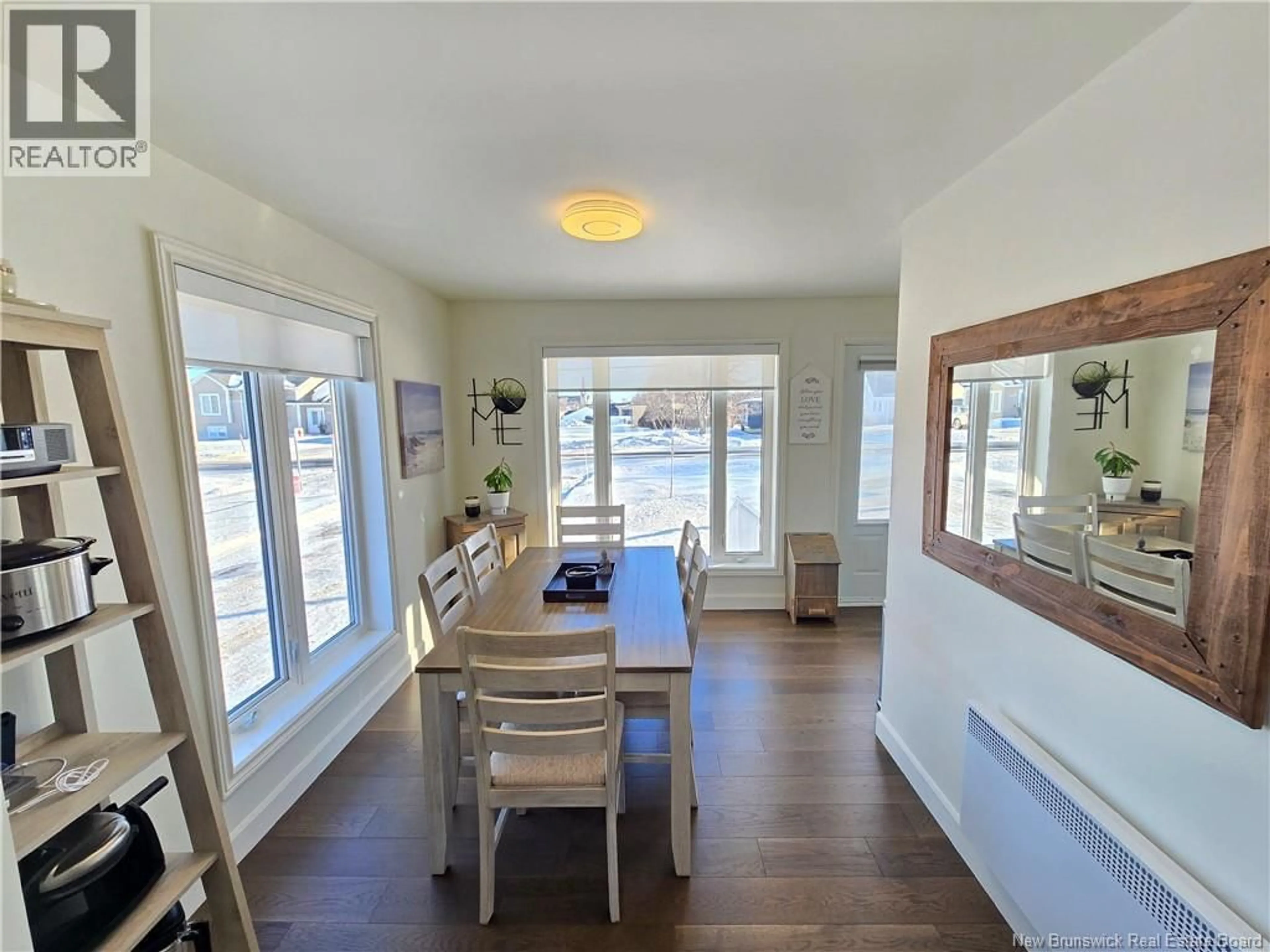 Dining room, wood/laminate floor for 258 PARC, Beresford New Brunswick E8K2E8