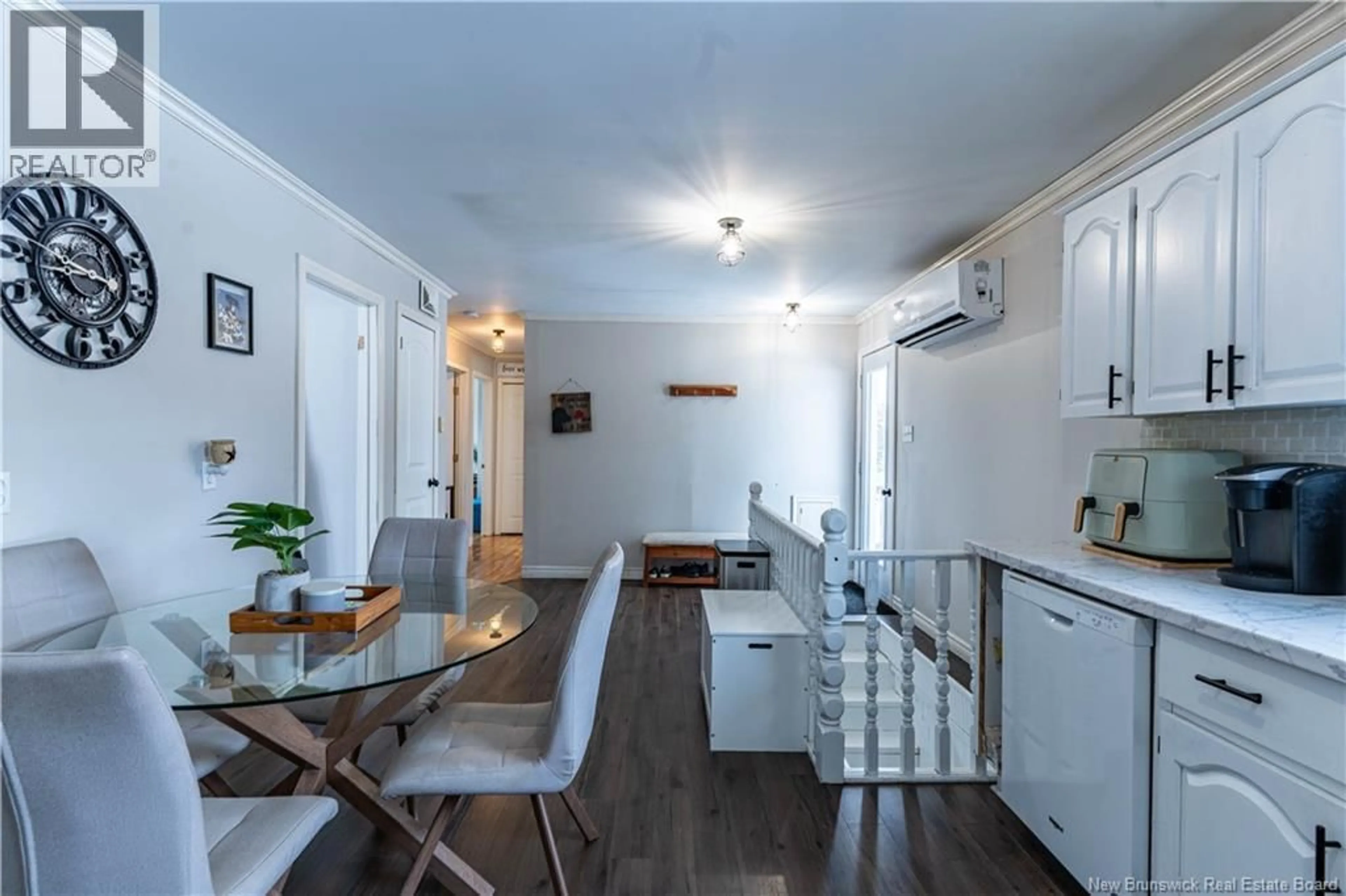 Open concept kitchen, wood/laminate floor for 1 LOCKE STREET, Miramichi New Brunswick E1V3W8