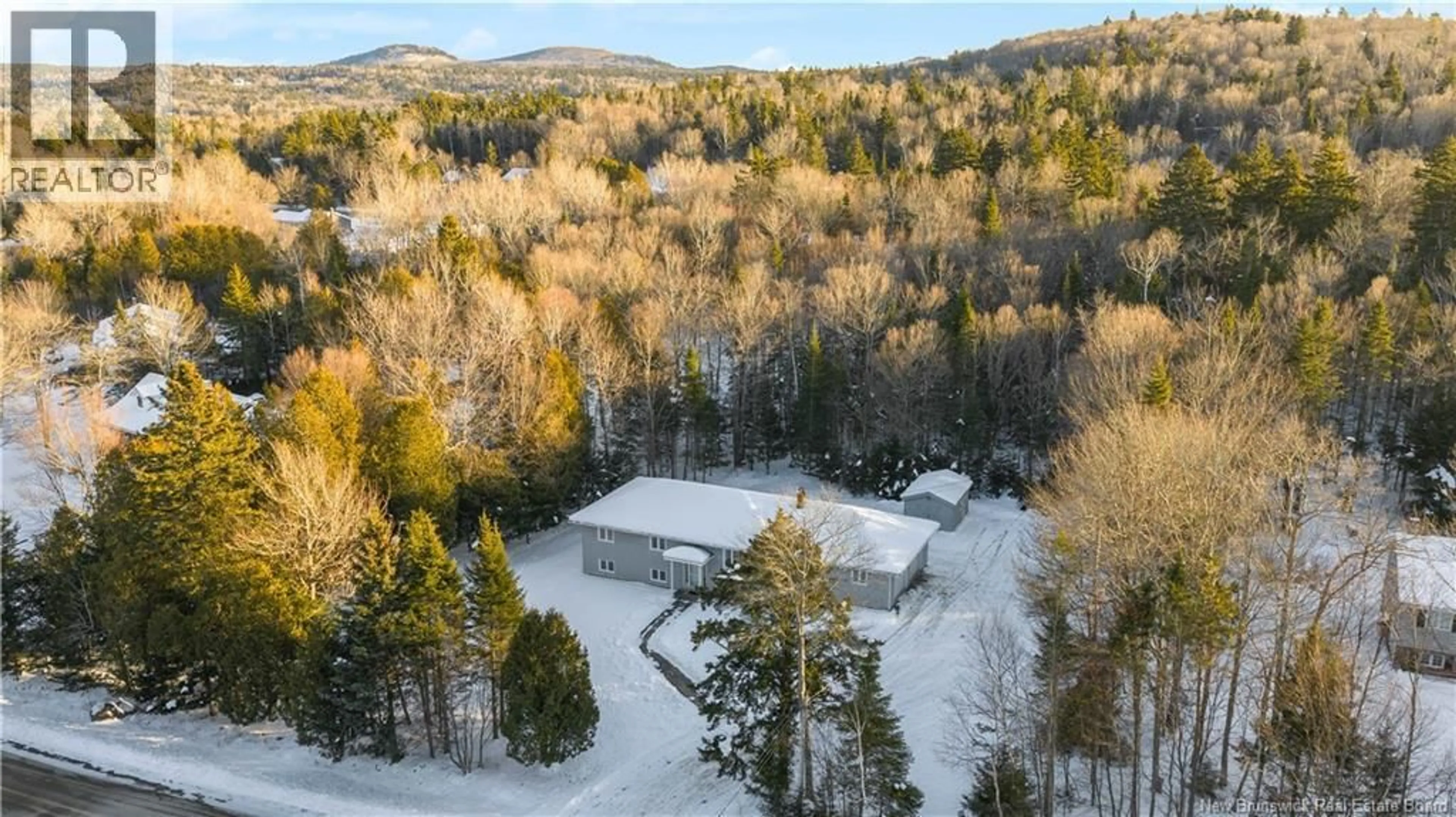 A pic from outside/outdoor area/front of a property/back of a property/a pic from drone, forest/trees view for 7 ROBIN LANE, Rothesay New Brunswick E2S1A4