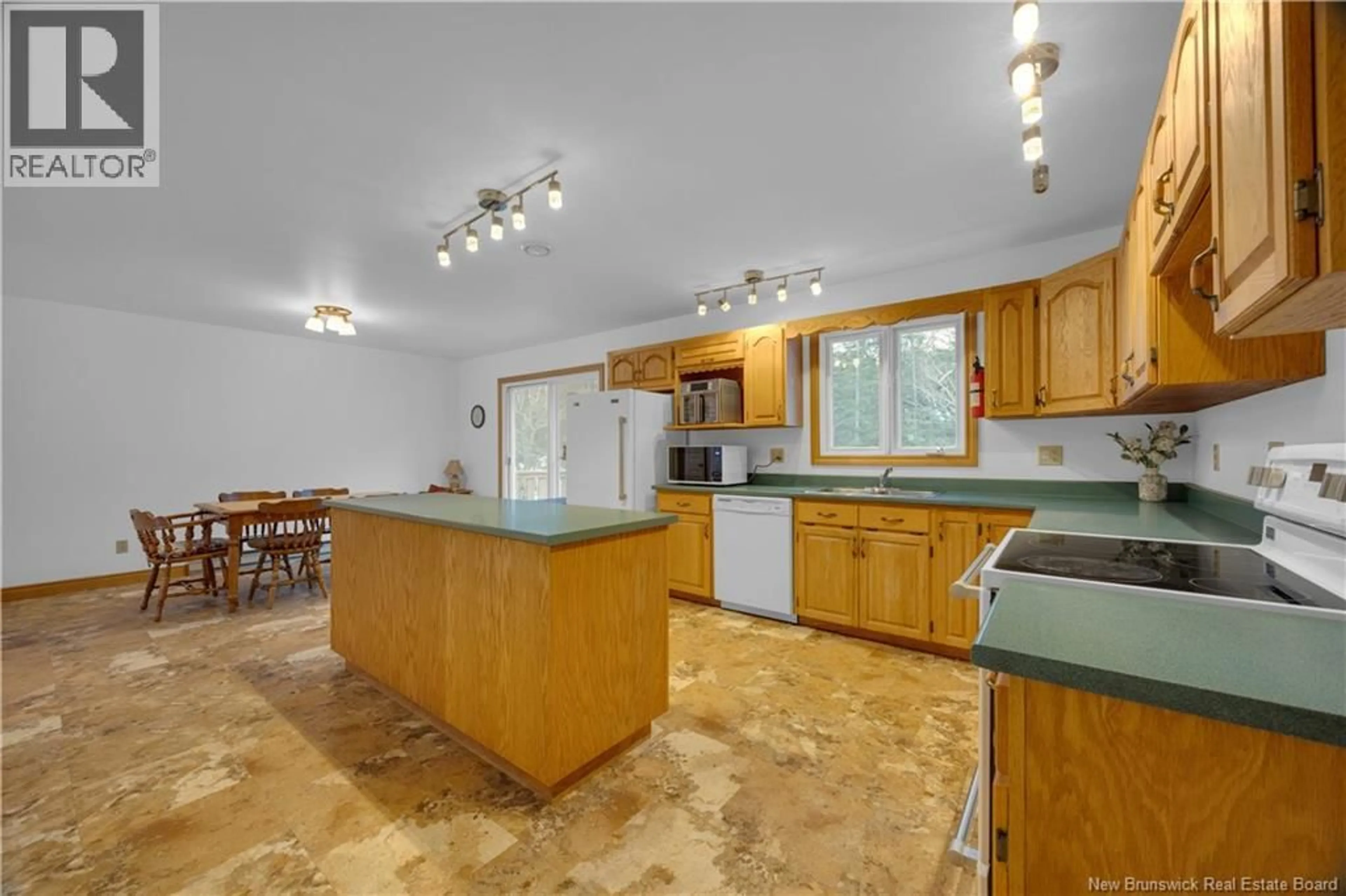 Open concept kitchen, ceramic/tile floor for 7 ROBIN LANE, Rothesay New Brunswick E2S1A4