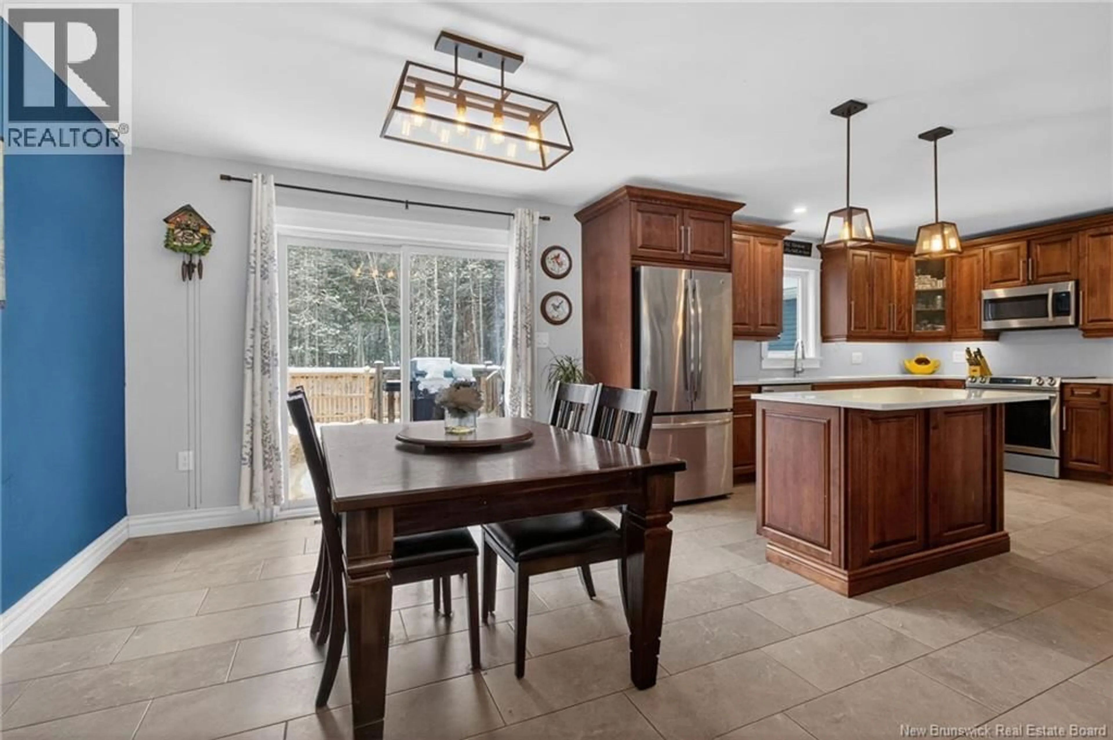 Open concept kitchen, ceramic/tile floor for 11 AMBER RIDGE COURT, Berry Mills New Brunswick E1G5R3