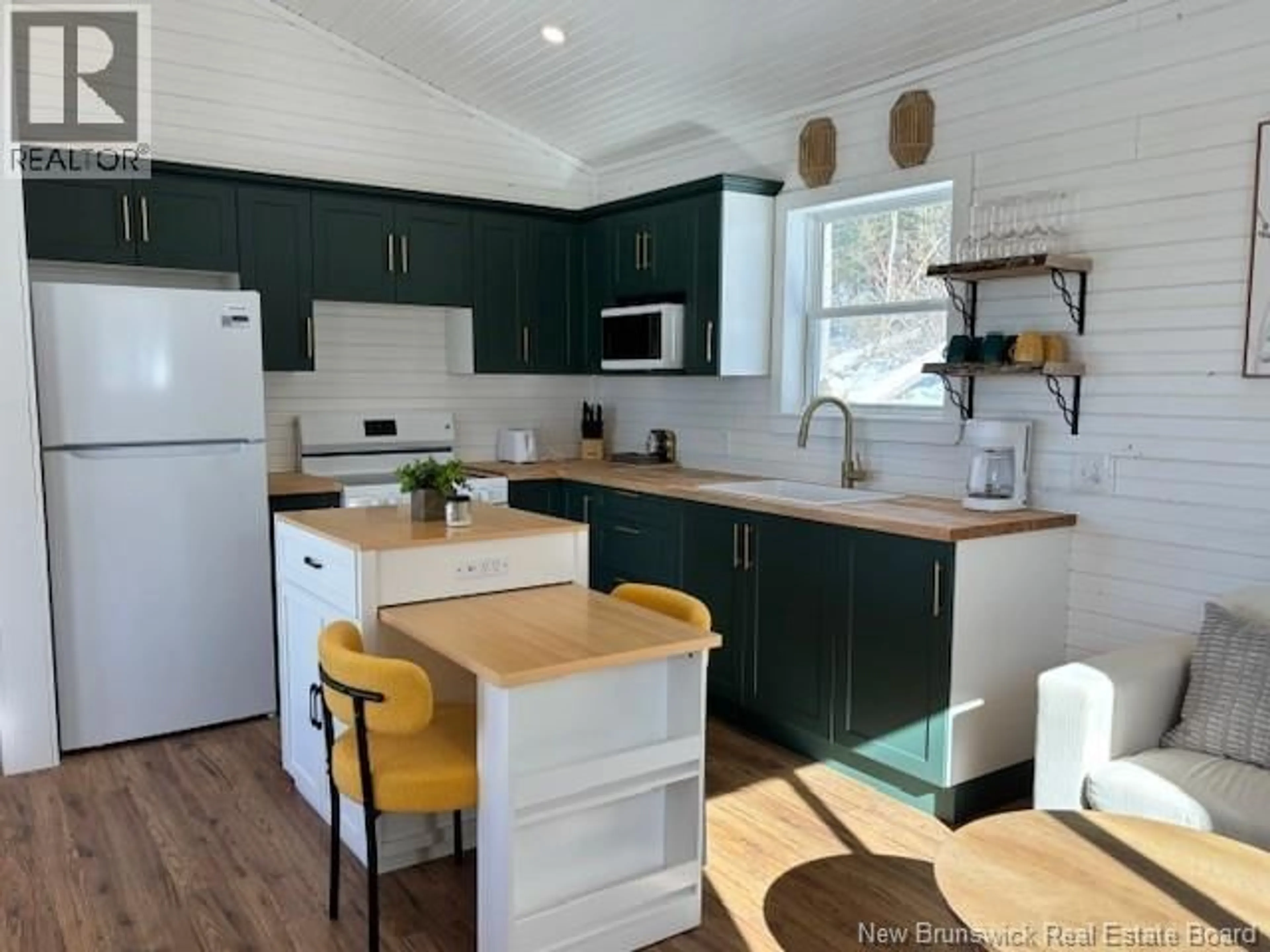 Open concept kitchen, wood/laminate floor for 97 BROWNS COVE ROAD, Kars New Brunswick E5T2Z5