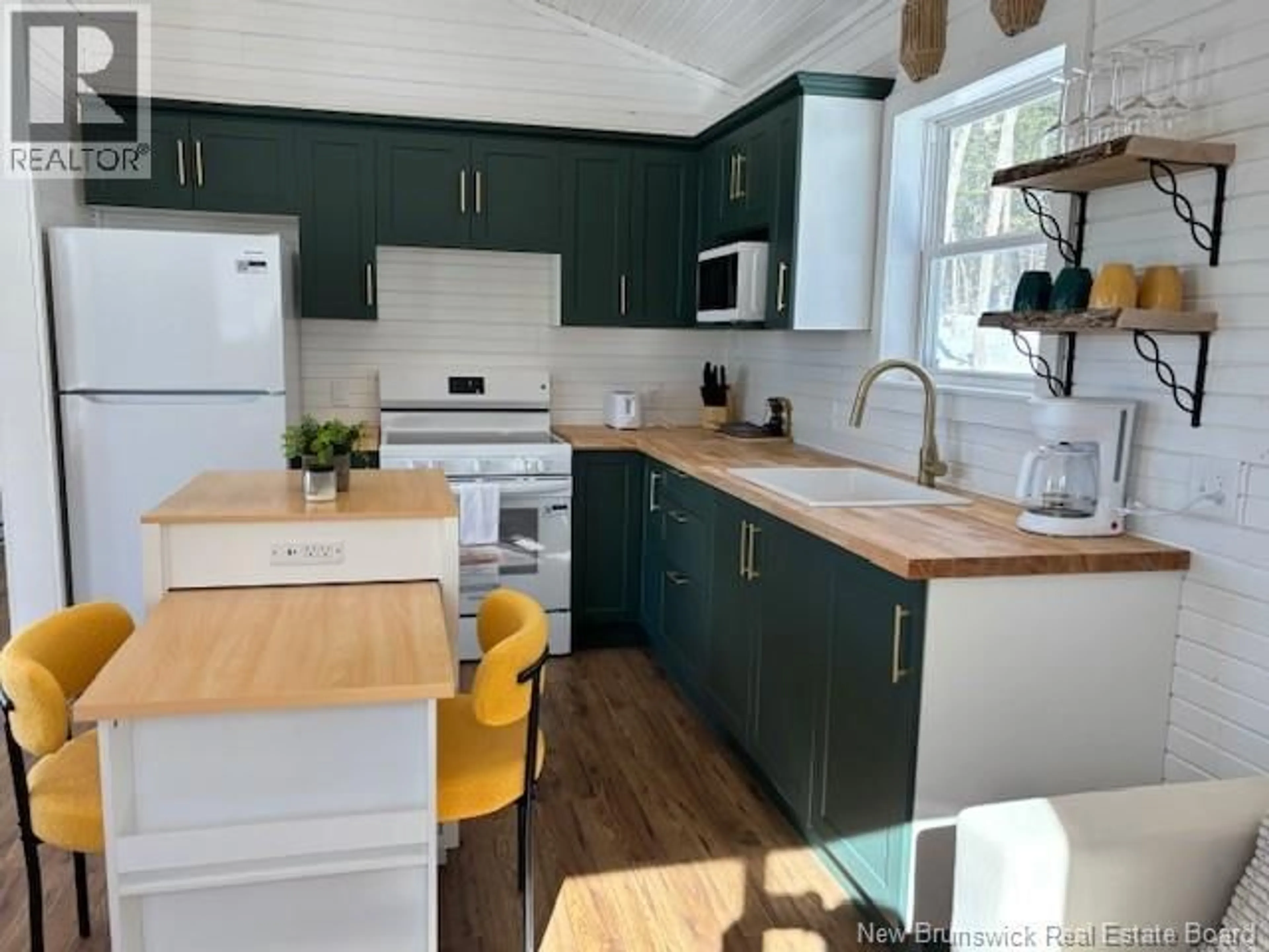 Open concept kitchen, wood/laminate floor for 97 BROWNS COVE ROAD, Kars New Brunswick E5T2Z5