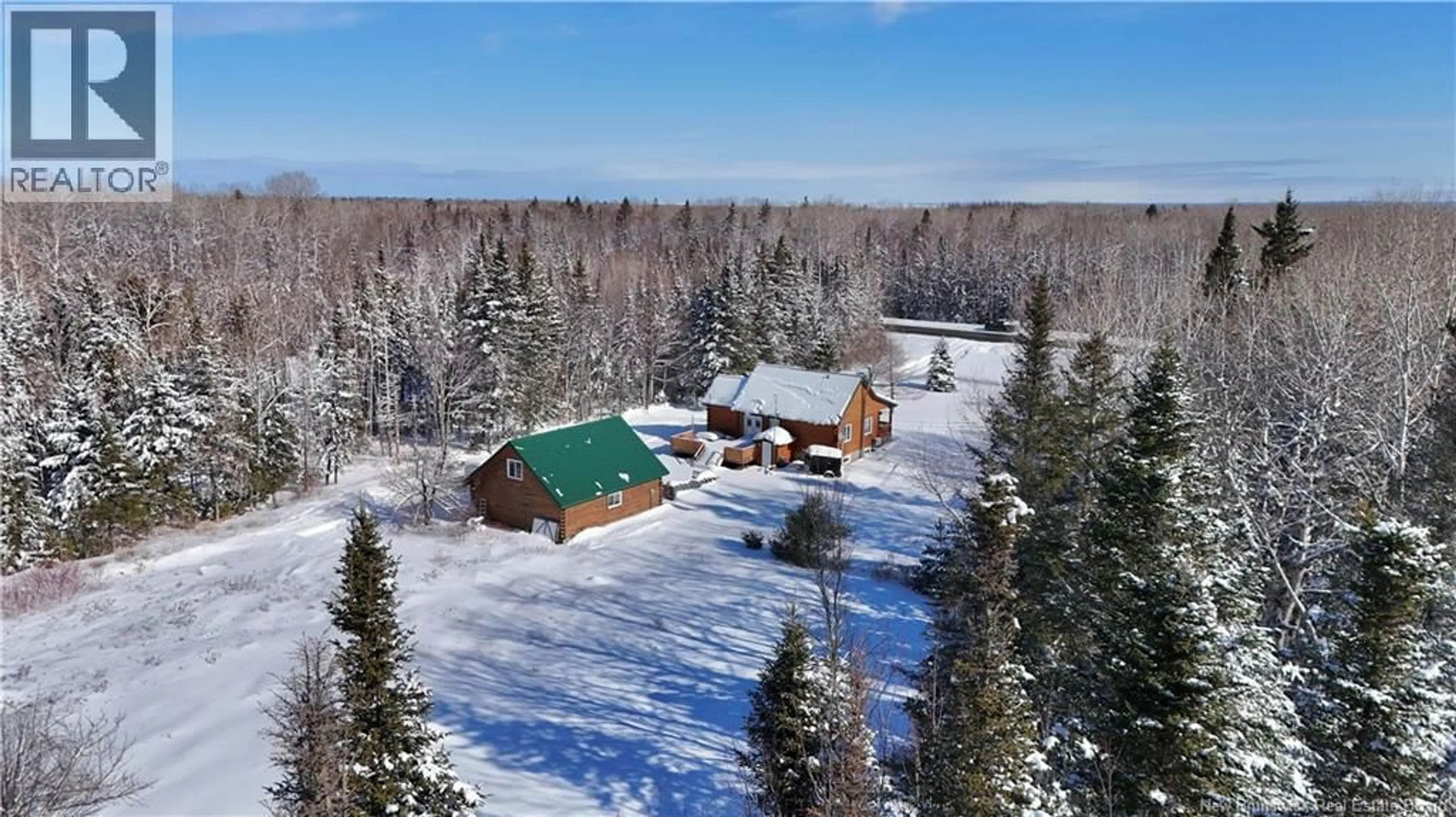 A pic from outside/outdoor area/front of a property/back of a property/a pic from drone, unknown for 1990 MIDDLE RIVER ROAD, Bathurst New Brunswick E2A6X4