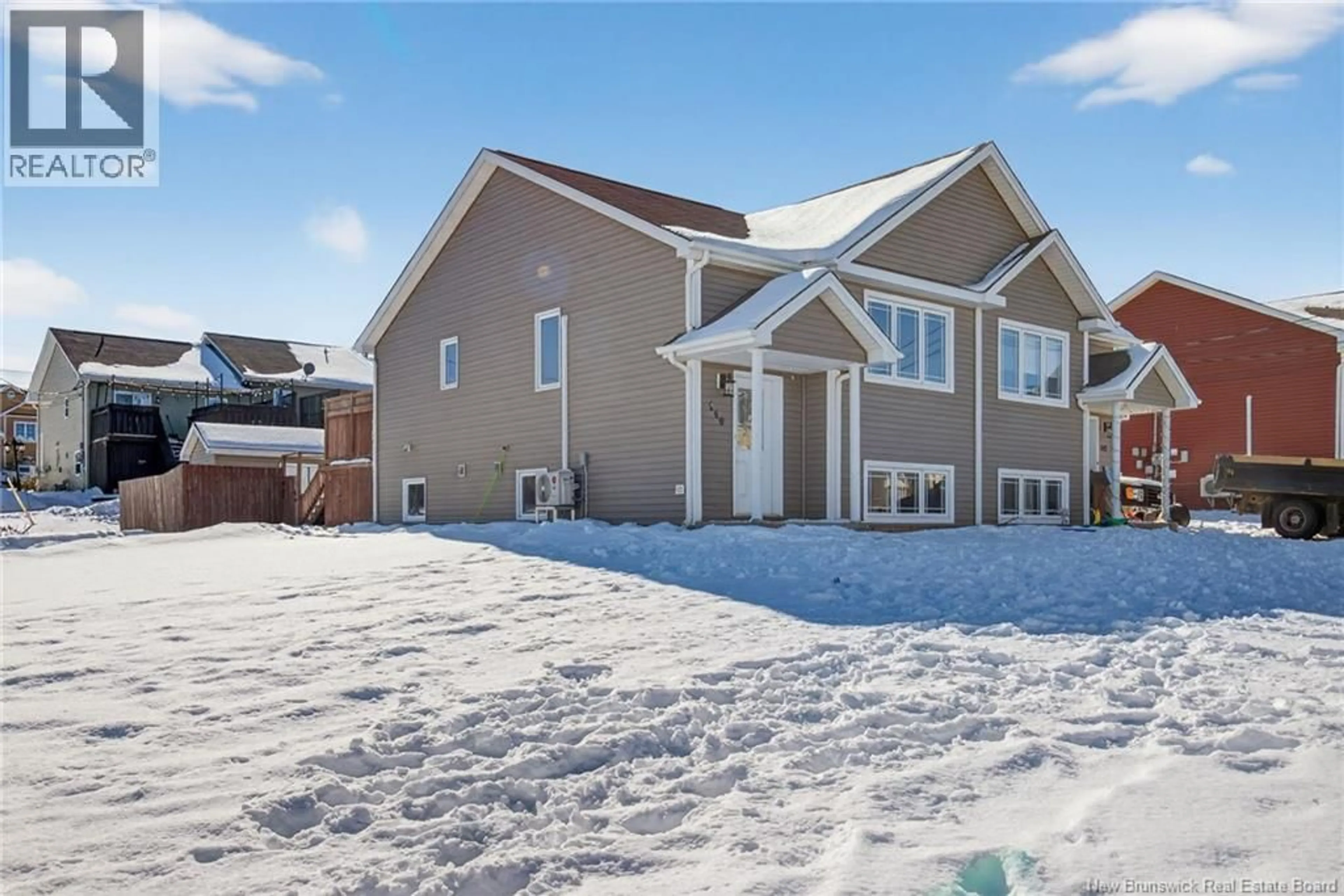 Home with vinyl exterior material, street for 140 HOULAHAN STREET, Dieppe New Brunswick E1A0S8