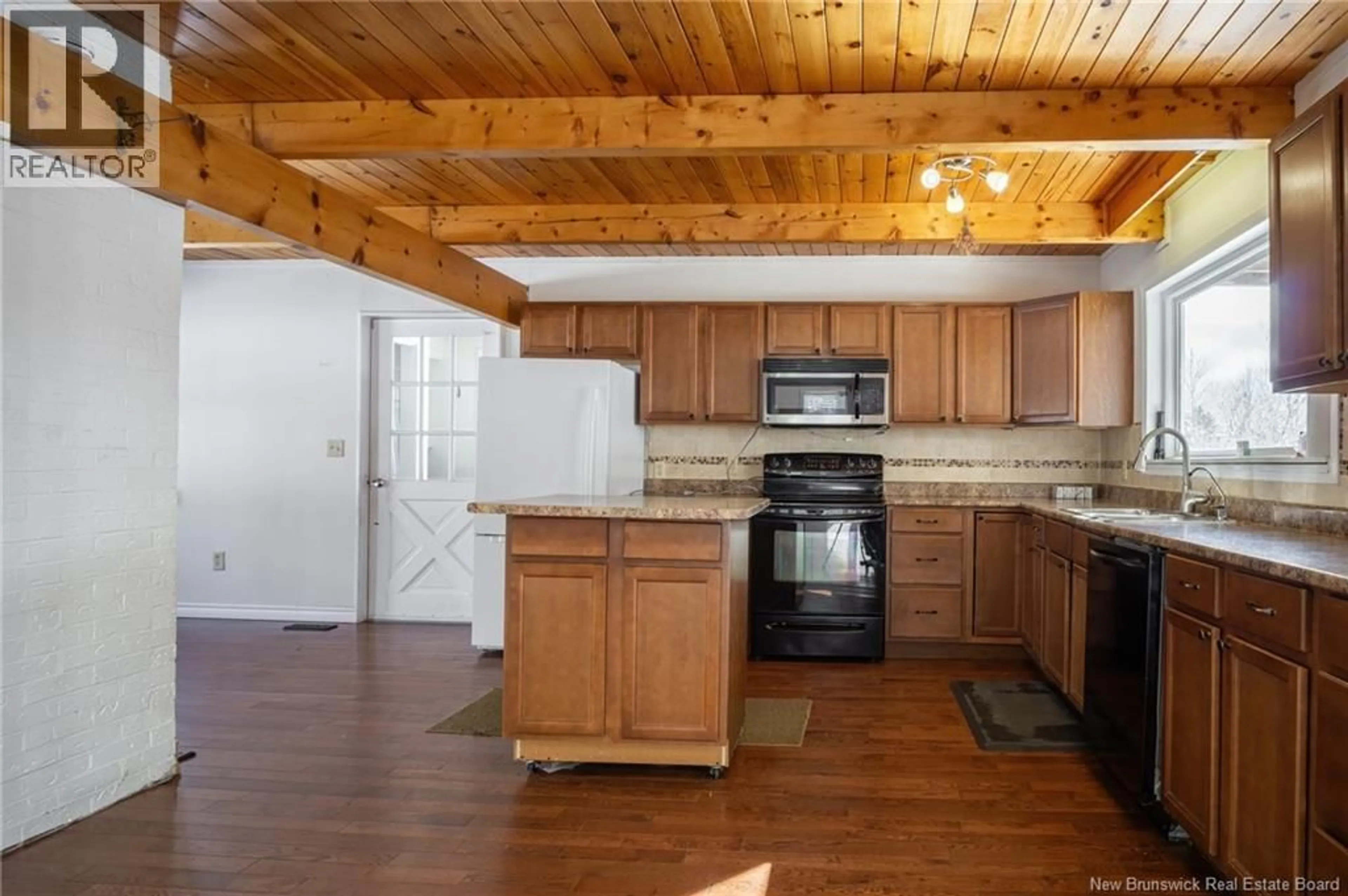 Open concept kitchen, wood/laminate floor for 96 TODDS POINT ROAD, Dufferin New Brunswick E3L3R1