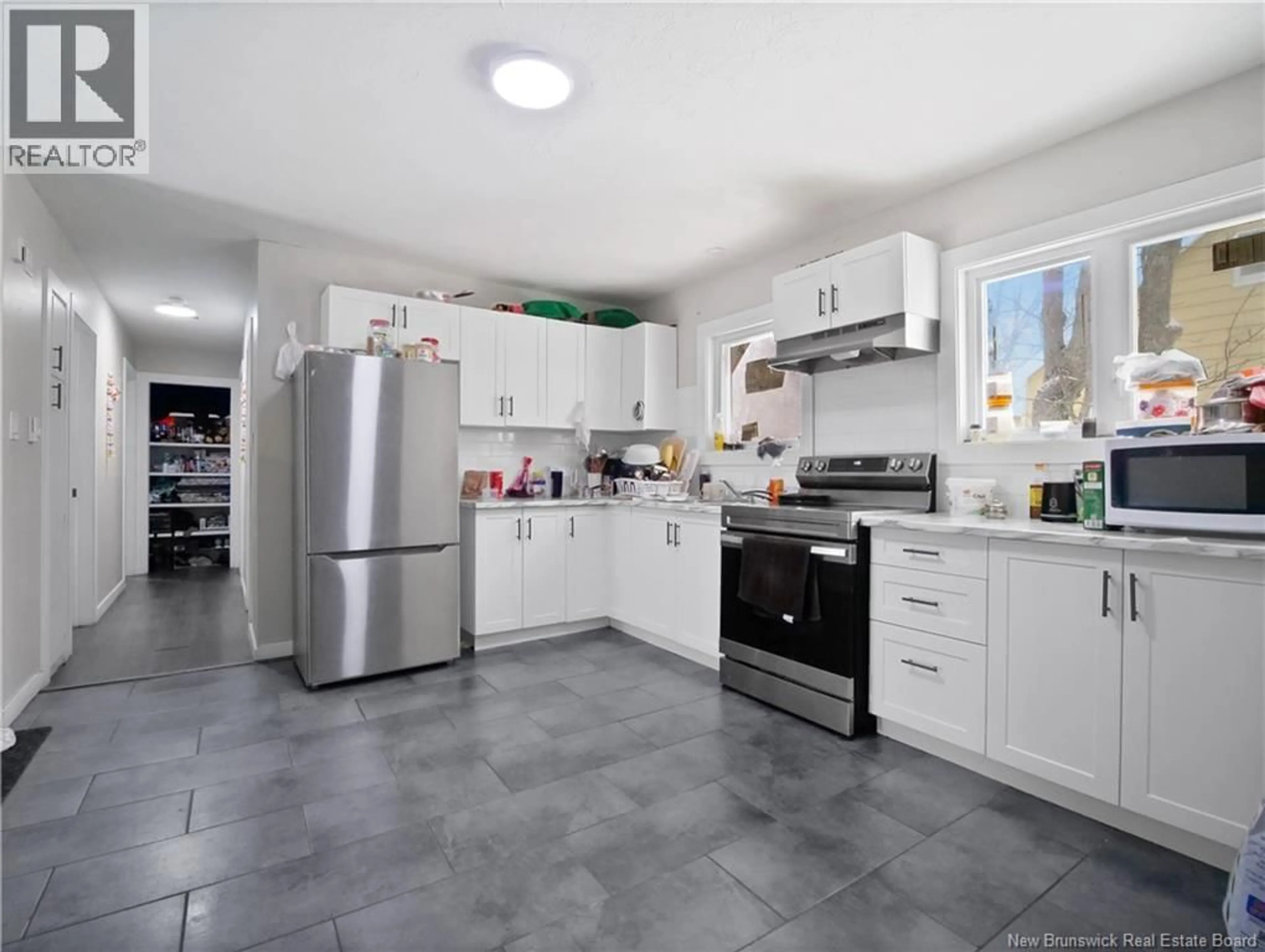 Open concept kitchen, ceramic/tile floor for 165 ARGYLE STREET, Moncton New Brunswick E1C6W2