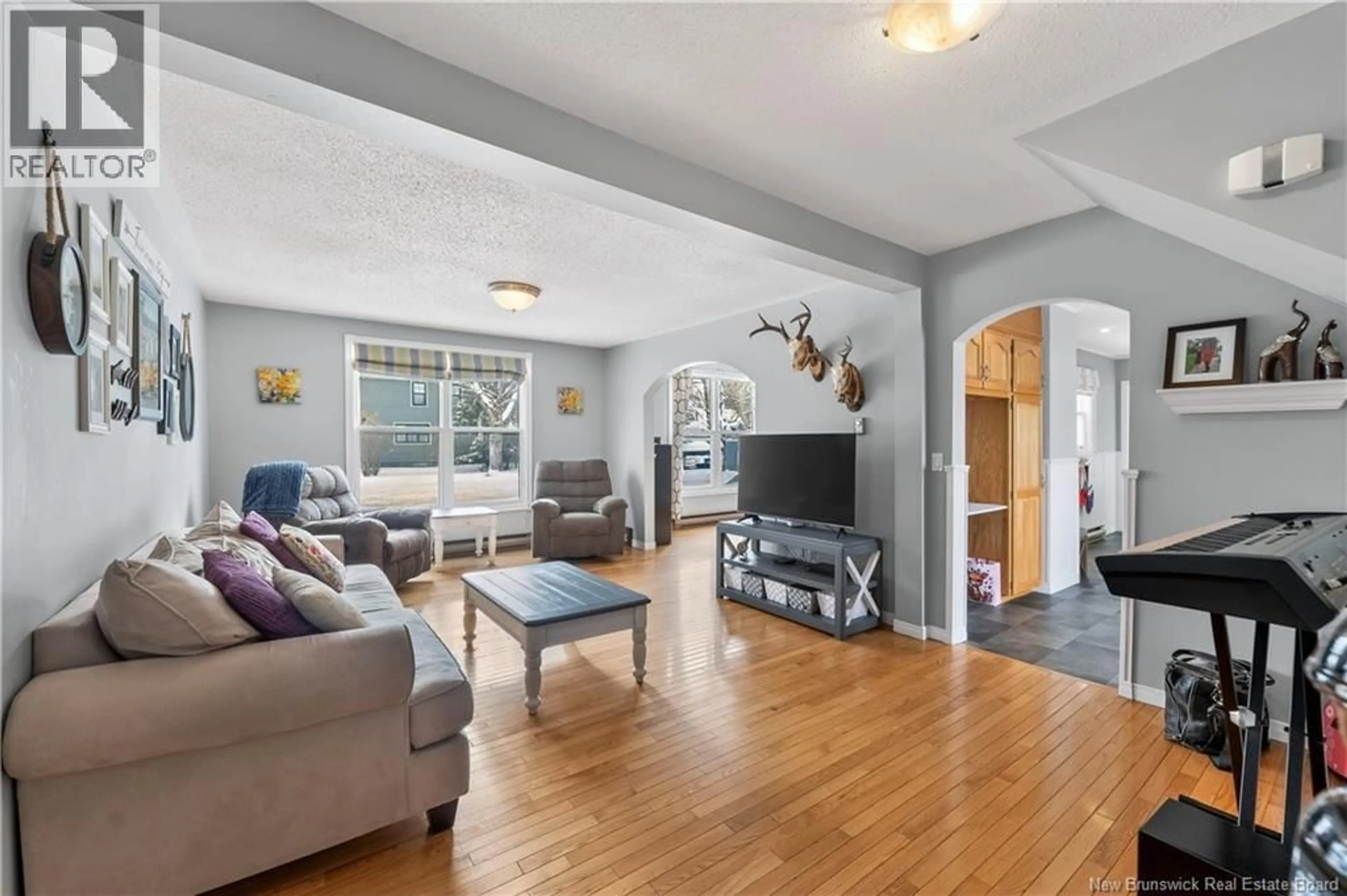 Living room with furniture, unknown for 40 CHURCHILL STREET, St. Stephen New Brunswick E3L2G4