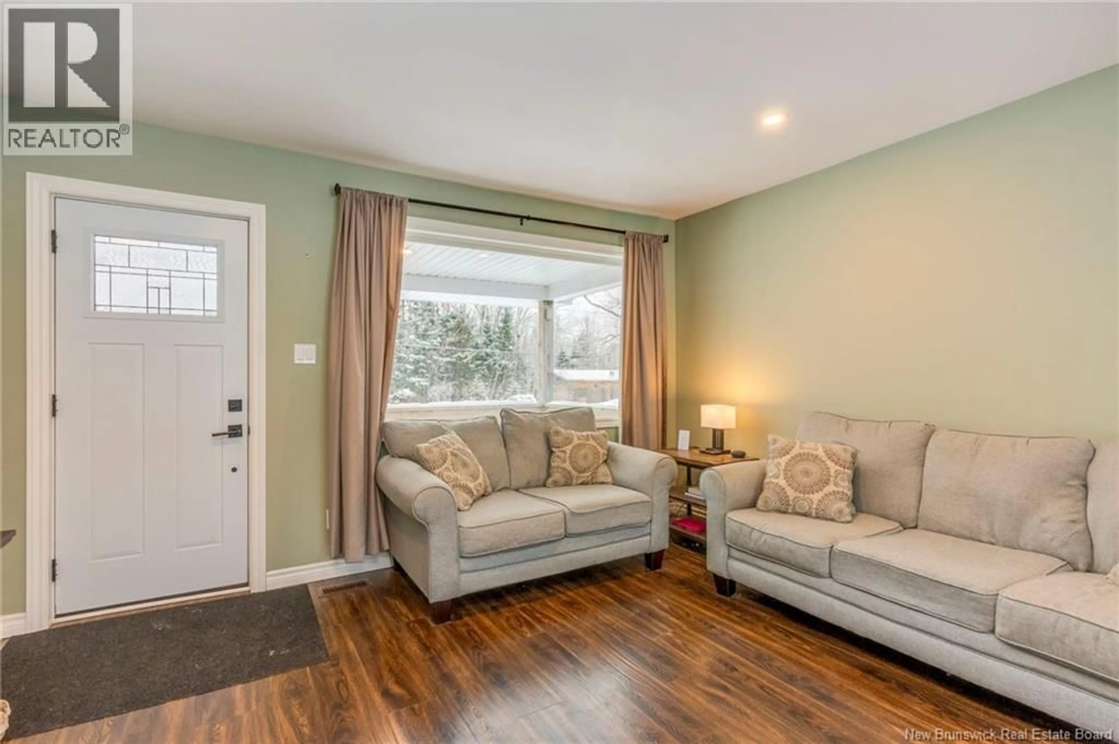 Living room with furniture, wood/laminate floor for 528 ROUTE 820, Baxters Corner New Brunswick E2S2J6