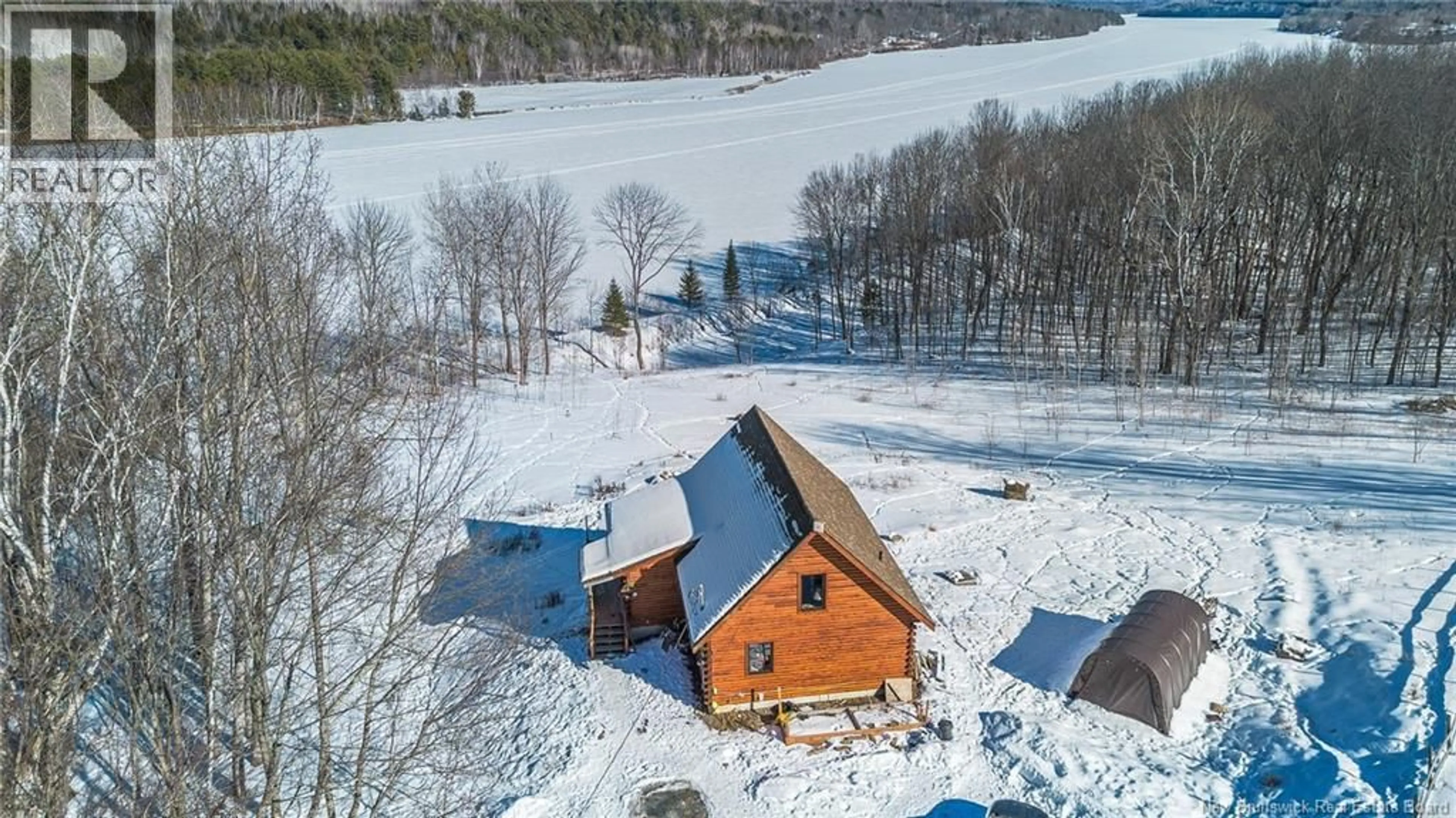 A pic from outside/outdoor area/front of a property/back of a property/a pic from drone, water/lake/river/ocean view for 507 ROUTE 165, Riceville New Brunswick E7N2Z3