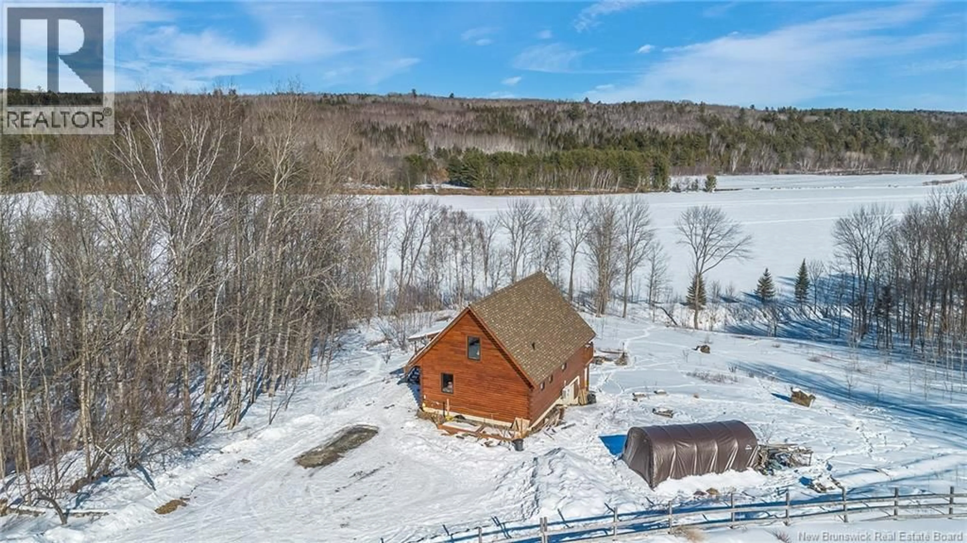 A pic from outside/outdoor area/front of a property/back of a property/a pic from drone, water/lake/river/ocean view for 507 ROUTE 165, Riceville New Brunswick E7N2Z3