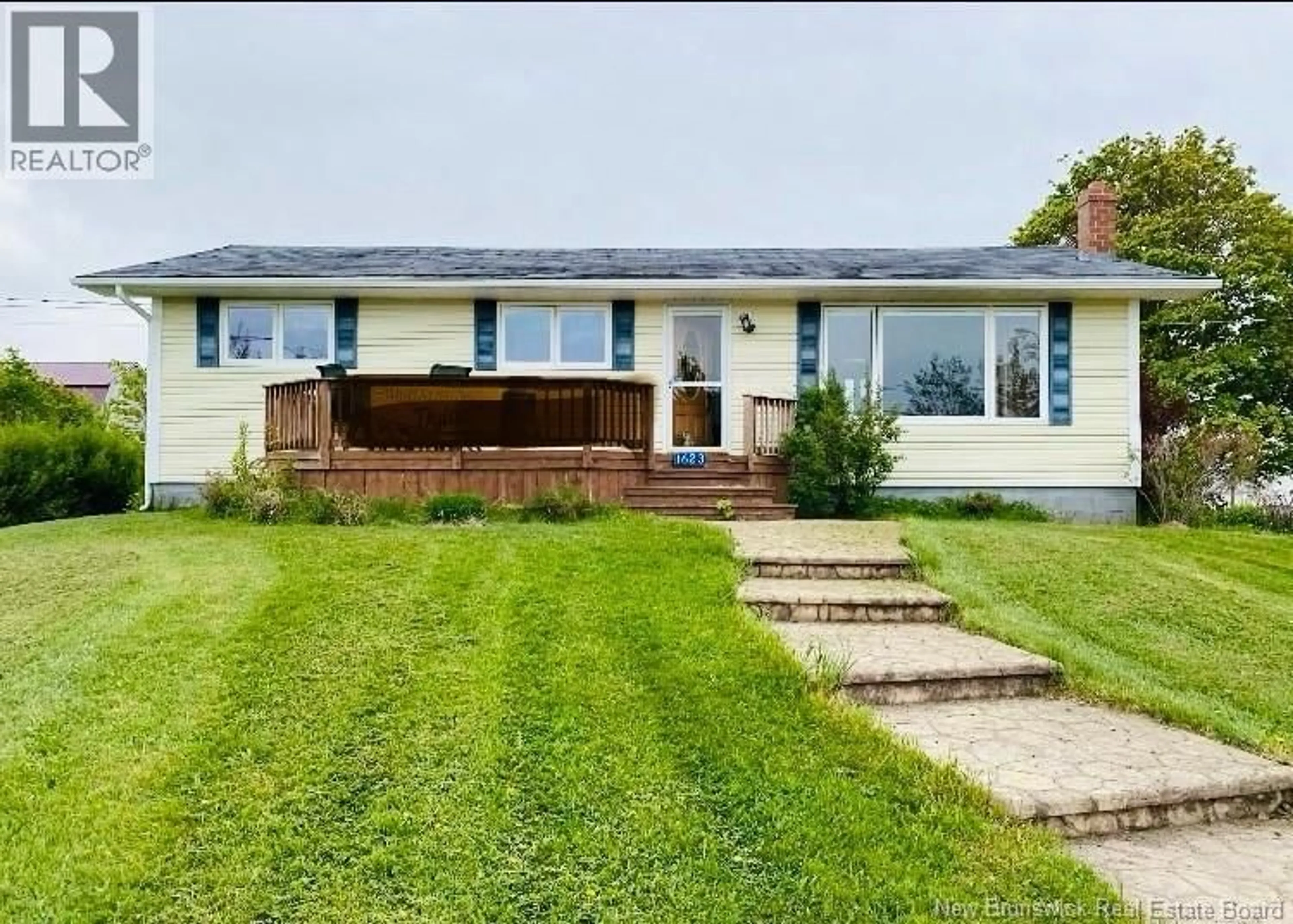 A pic from outside/outdoor area/front of a property/back of a property/a pic from drone, street for 1623 RTE 133, Grand-Barachois New Brunswick E4P8E3