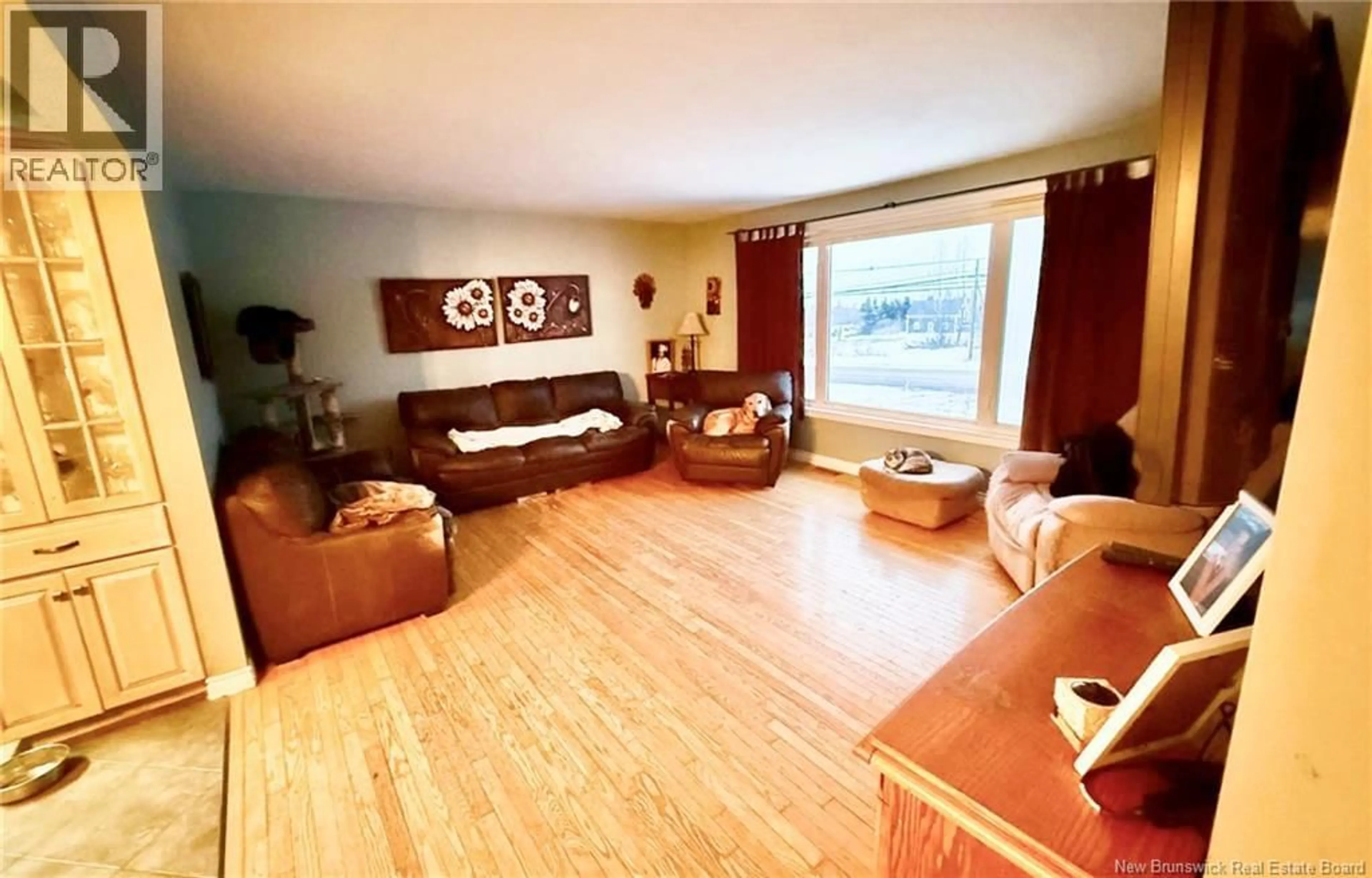 Living room with furniture, wood/laminate floor for 1623 RTE 133, Grand-Barachois New Brunswick E4P8E3