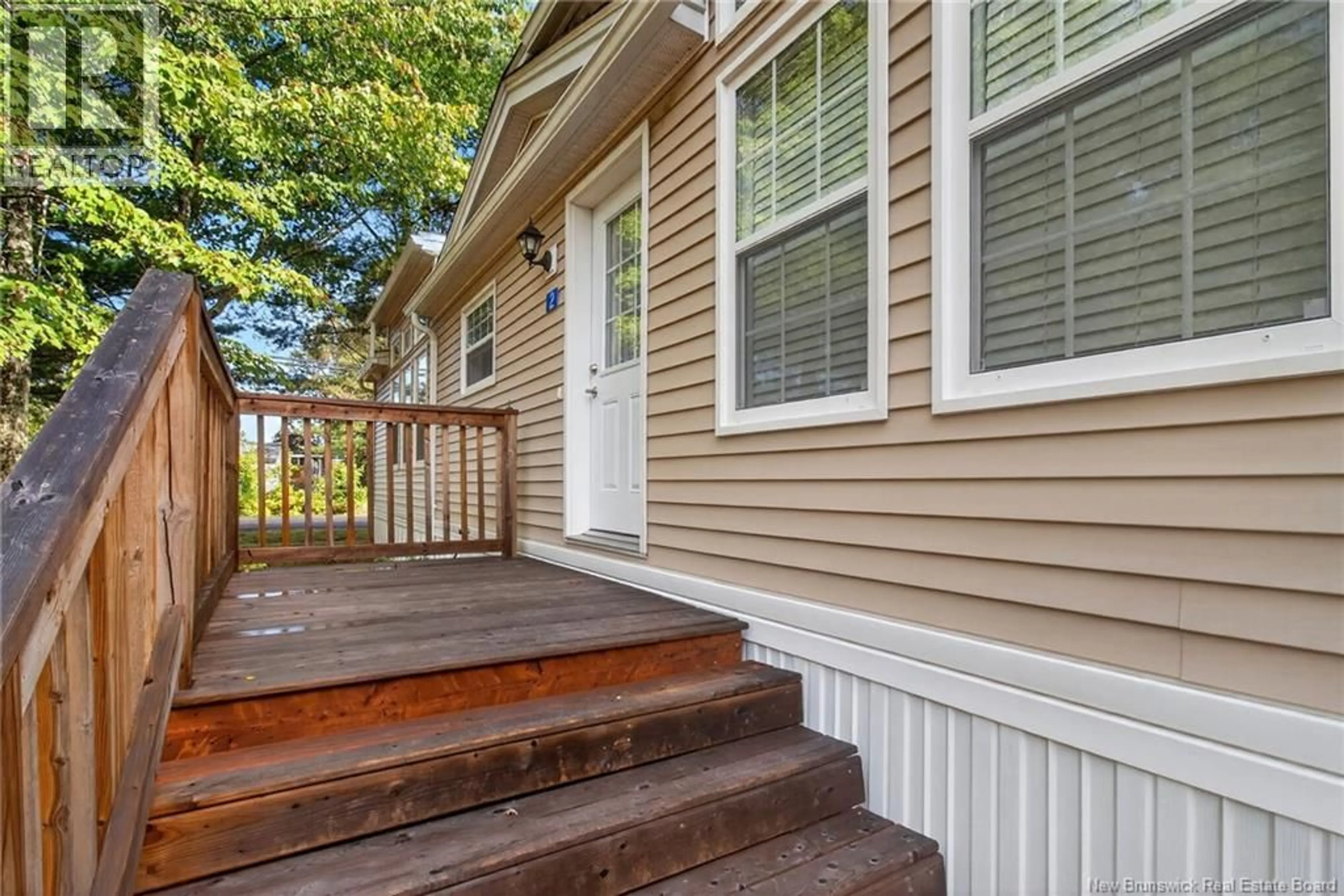 Home with vinyl exterior material, street for 2 LARCHWOOD STREET, Moncton New Brunswick E1H2Y2