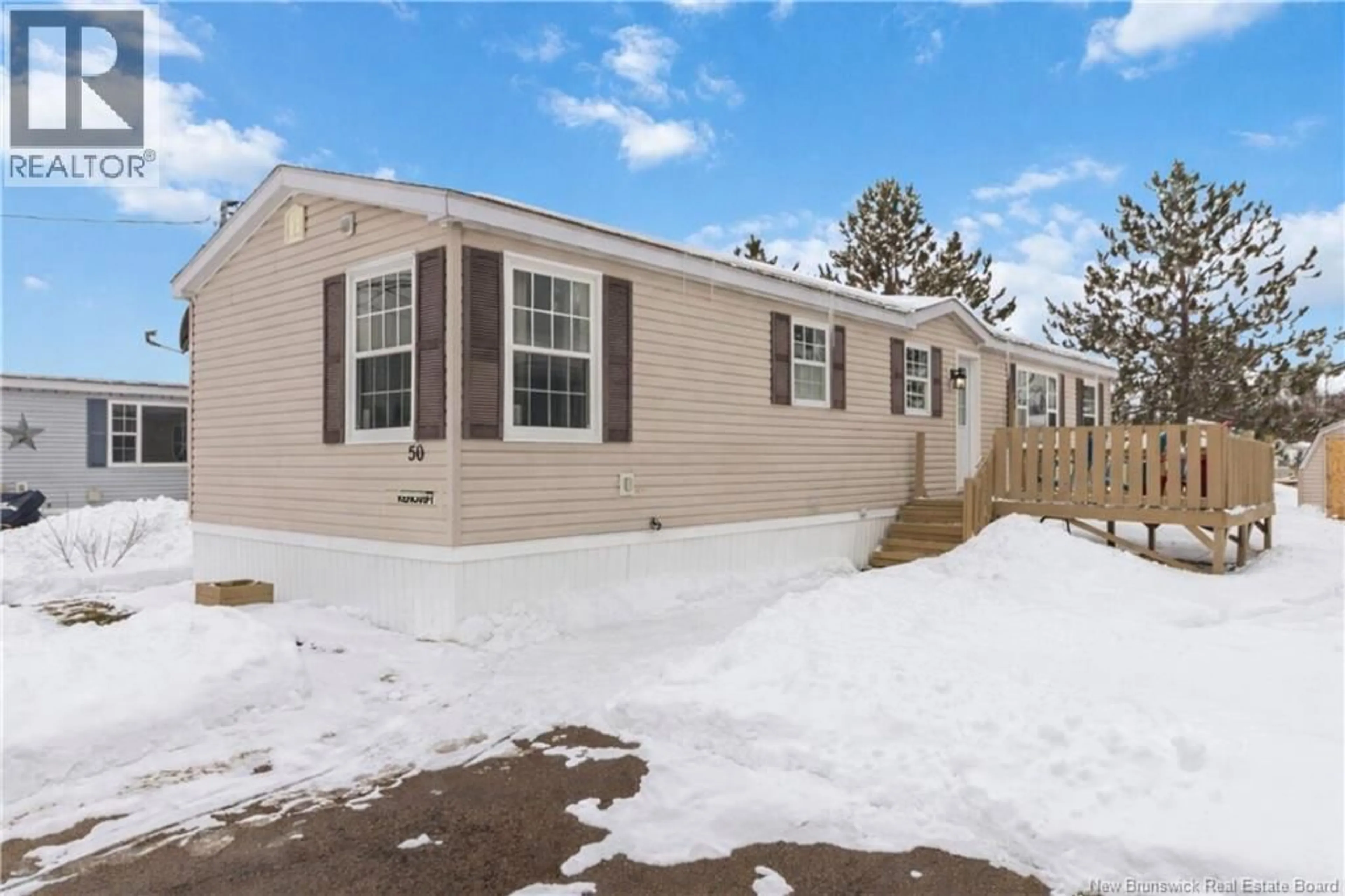 Home with vinyl exterior material, street for 50 ANDRE DRIVE, Dieppe New Brunswick E1A7C3