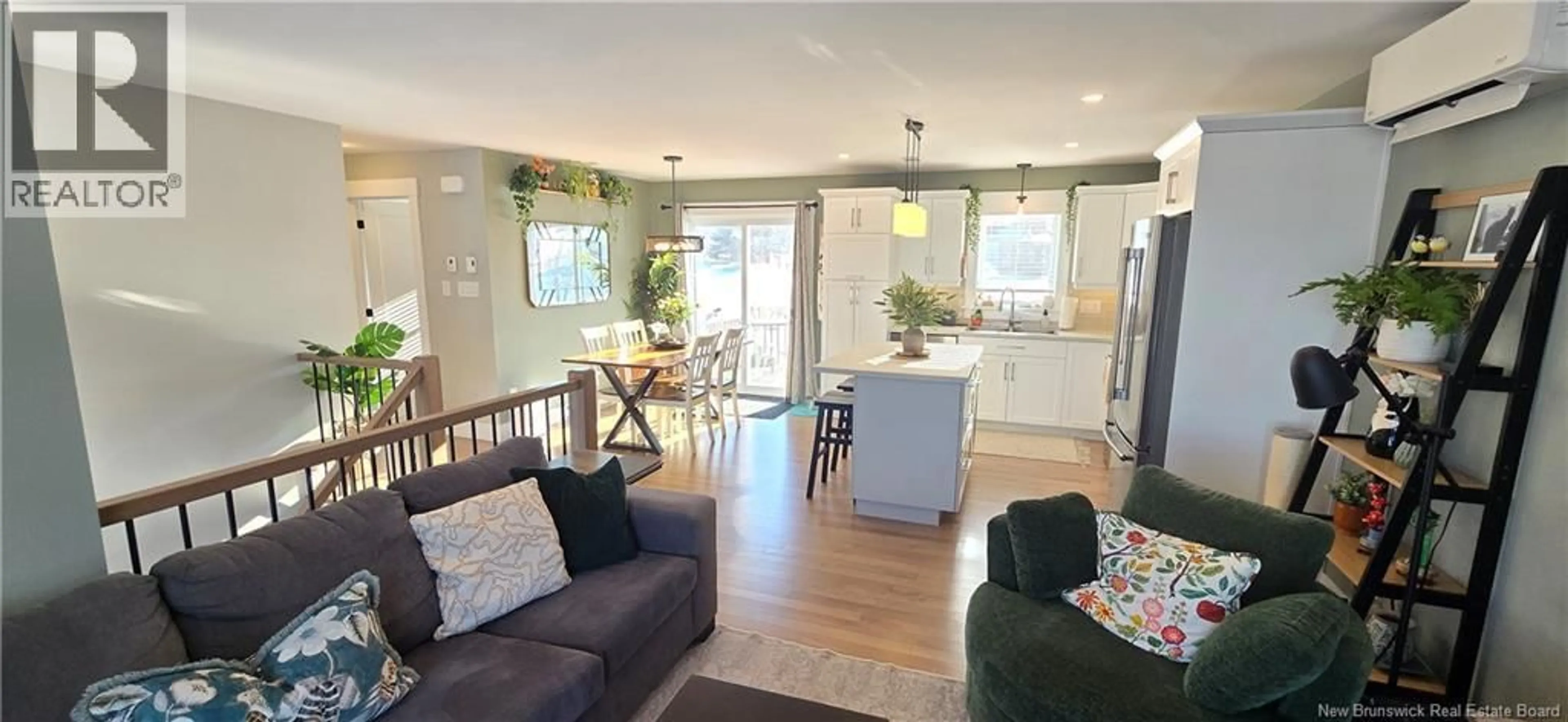 Open concept kitchen, wood/laminate floor for 10 LEANDRE STREET, Memramcook New Brunswick E4K0B9