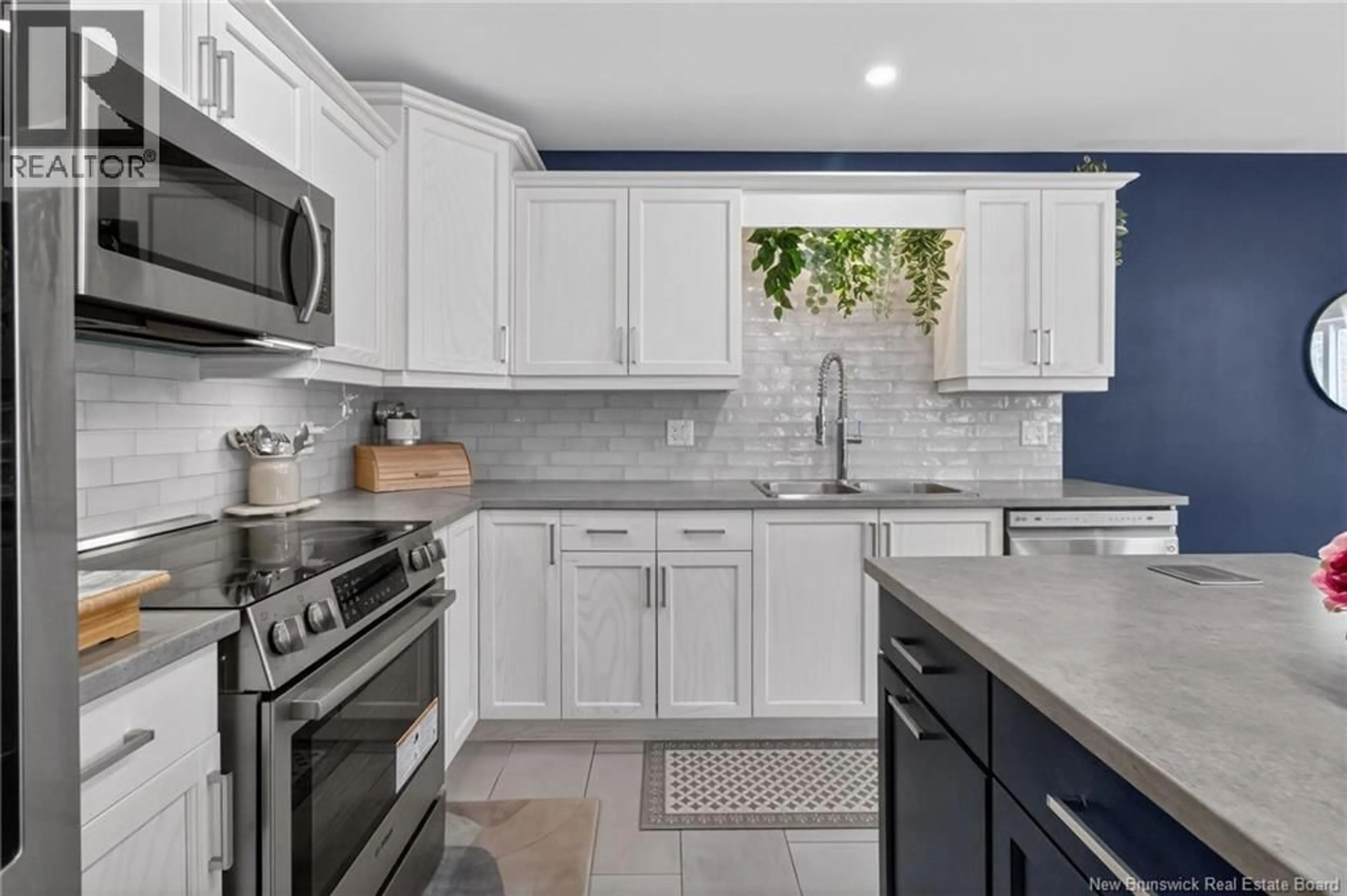 Open concept kitchen, ceramic/tile floor for 263 DOLBEAU STREET, Dieppe New Brunswick E1A9P9