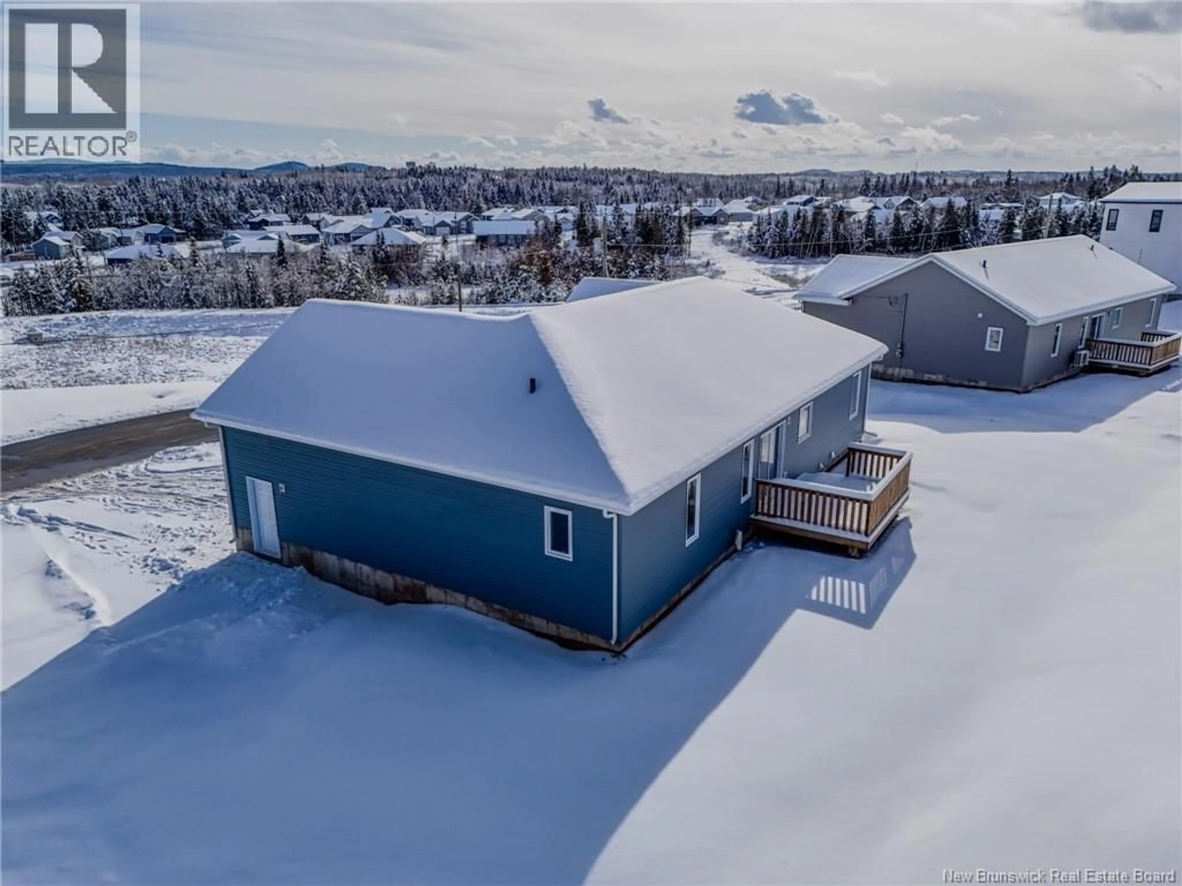 A pic from outside/outdoor area/front of a property/back of a property/a pic from drone, water/lake/river/ocean view for 8 GROSBEAK DRIVE, Quispamsis New Brunswick E2E0Y5