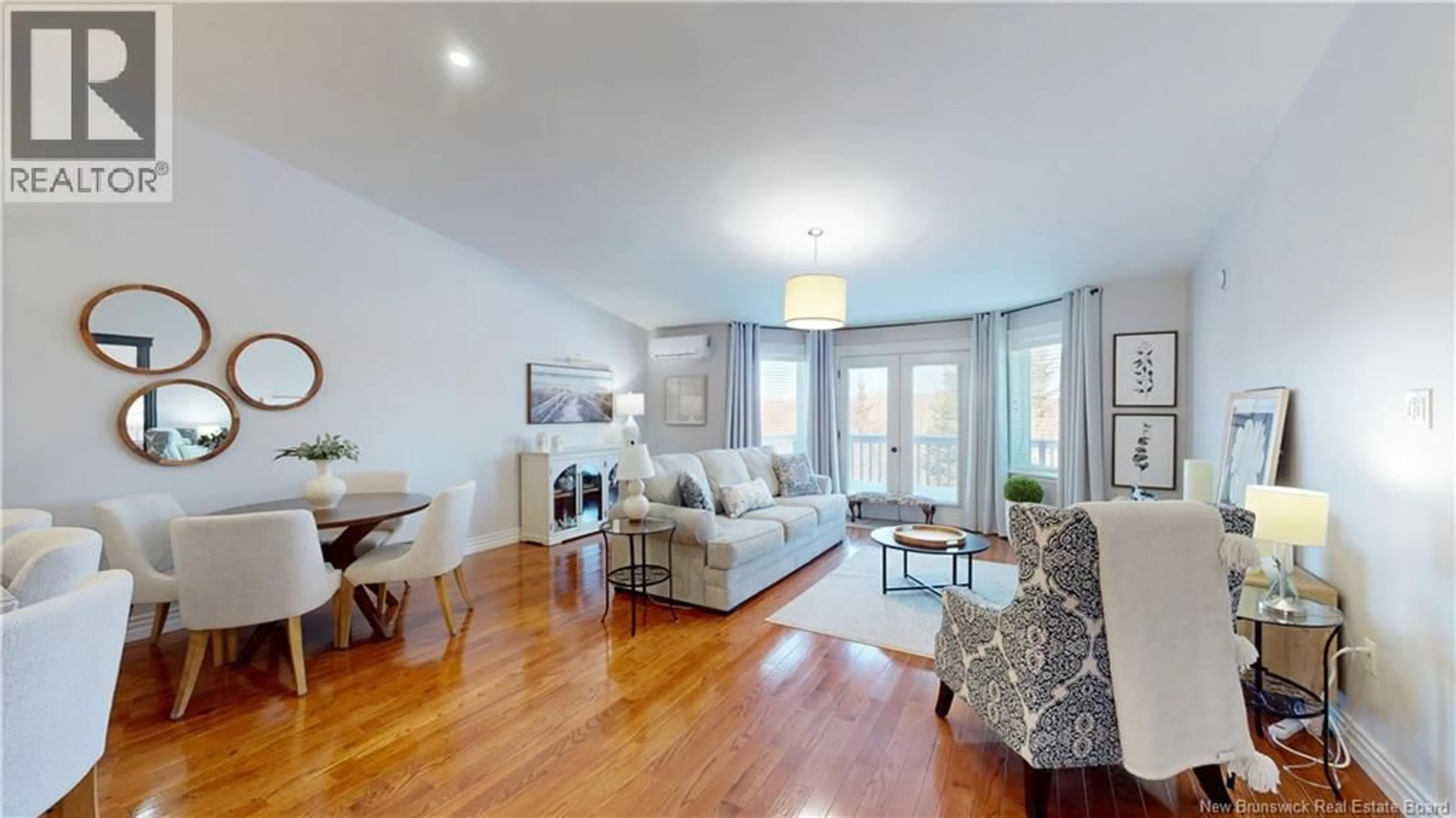 Living room with furniture, wood/laminate floor for 49 MERRITT HILL ROAD, Quispamsis New Brunswick E2E6A1