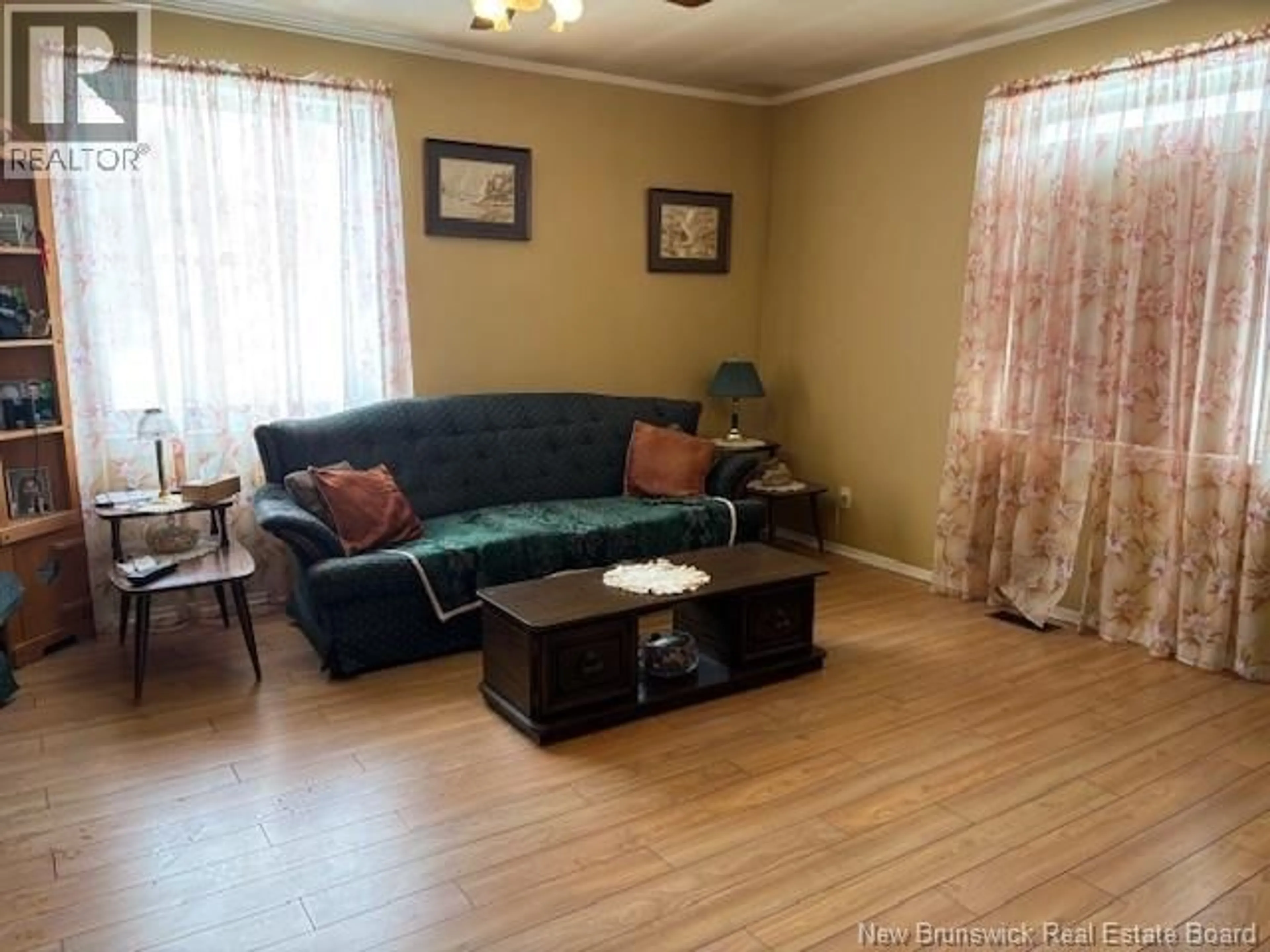 Living room with furniture, wood/laminate floor for 70 DINGLEY ROAD, Head Of Millstream New Brunswick E4G1A7
