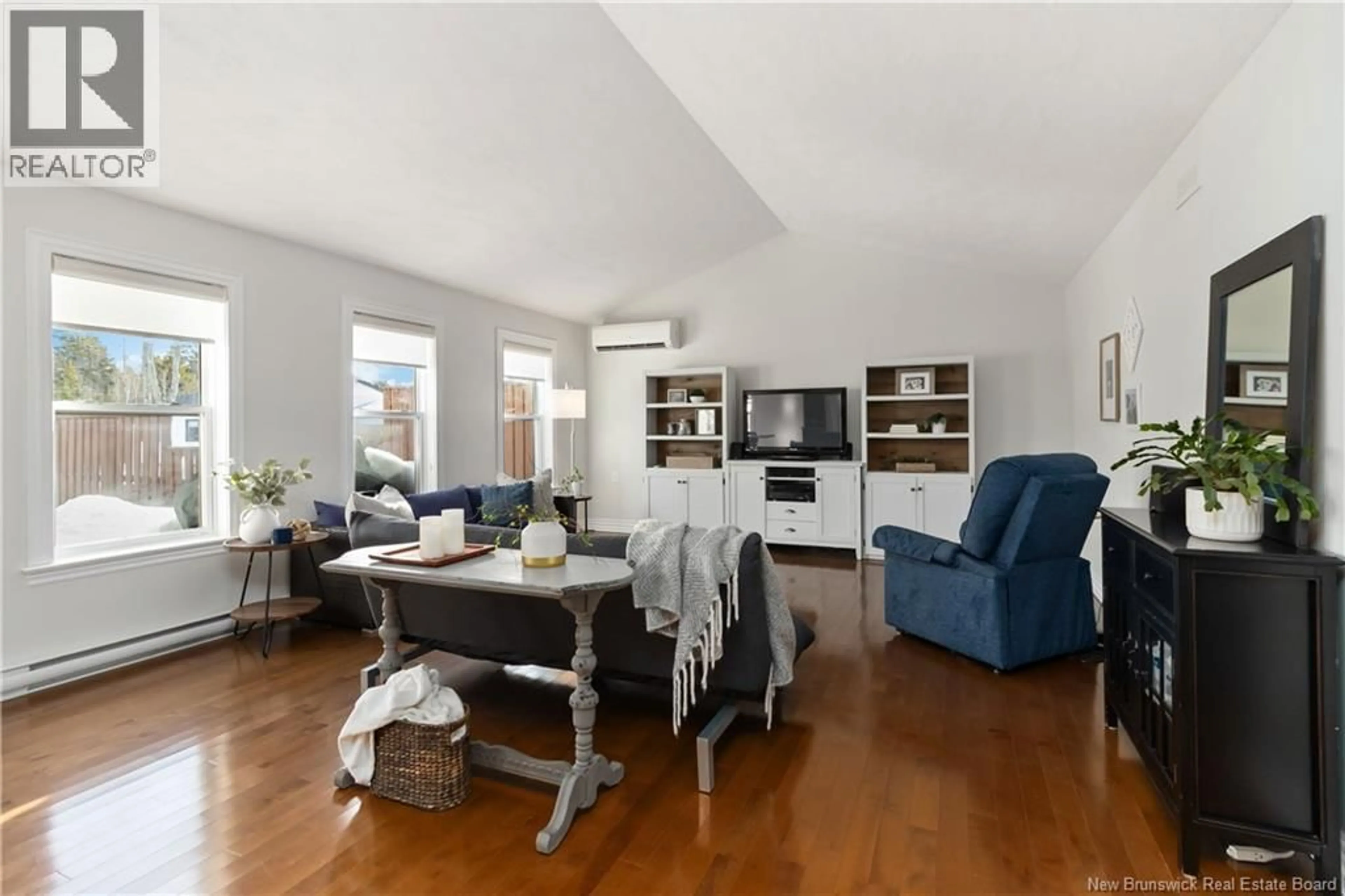 Living room with furniture, wood/laminate floor for 432 BELLIVEAU STREET, Dieppe New Brunswick E1A6W6