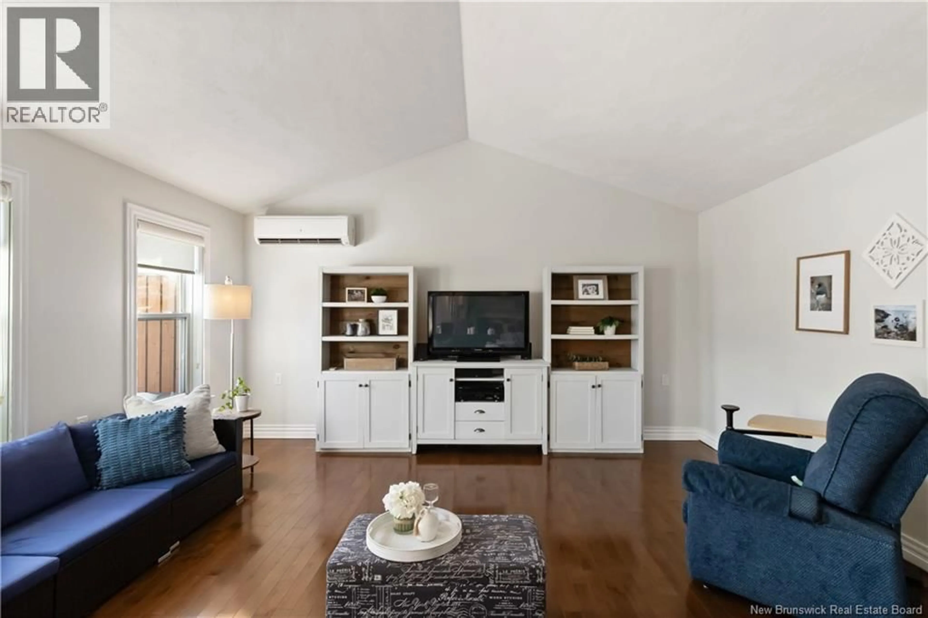 Living room with furniture, wood/laminate floor for 432 BELLIVEAU STREET, Dieppe New Brunswick E1A6W6