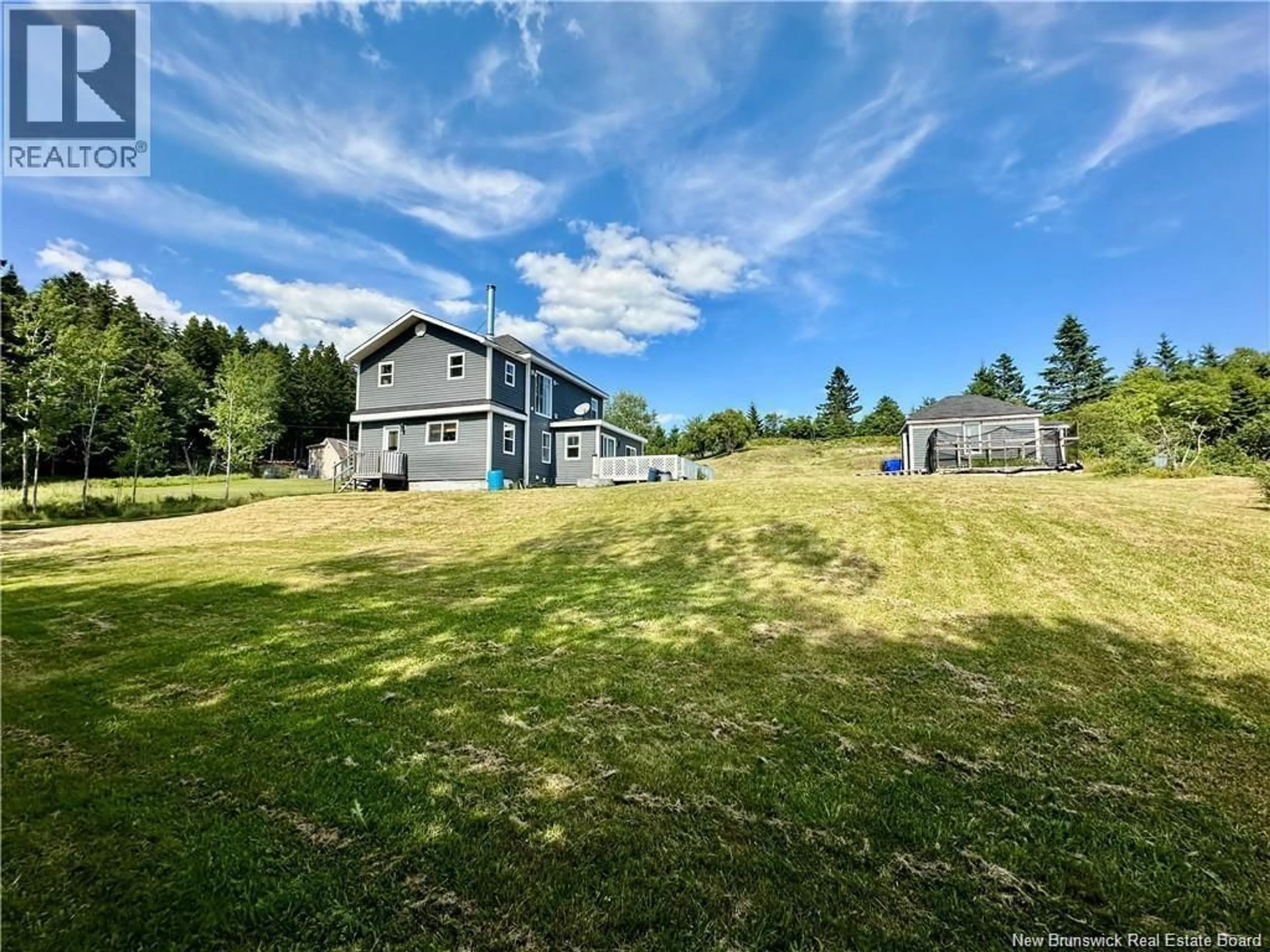 A pic from outside/outdoor area/front of a property/back of a property/a pic from drone, water/lake/river/ocean view for 635 MAIN STREET, Beaver Harbour New Brunswick E5H1N8