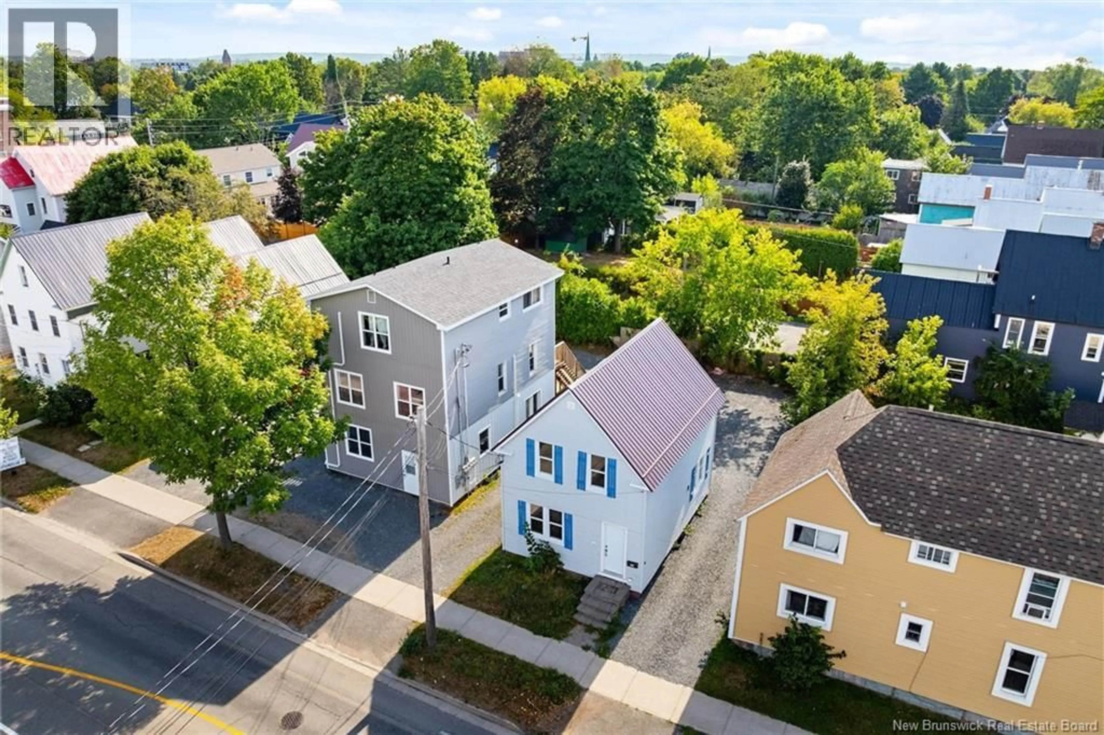A pic from outside/outdoor area/front of a property/back of a property/a pic from drone, street for 332 SMYTHE STREET, Fredericton New Brunswick E3B3E2