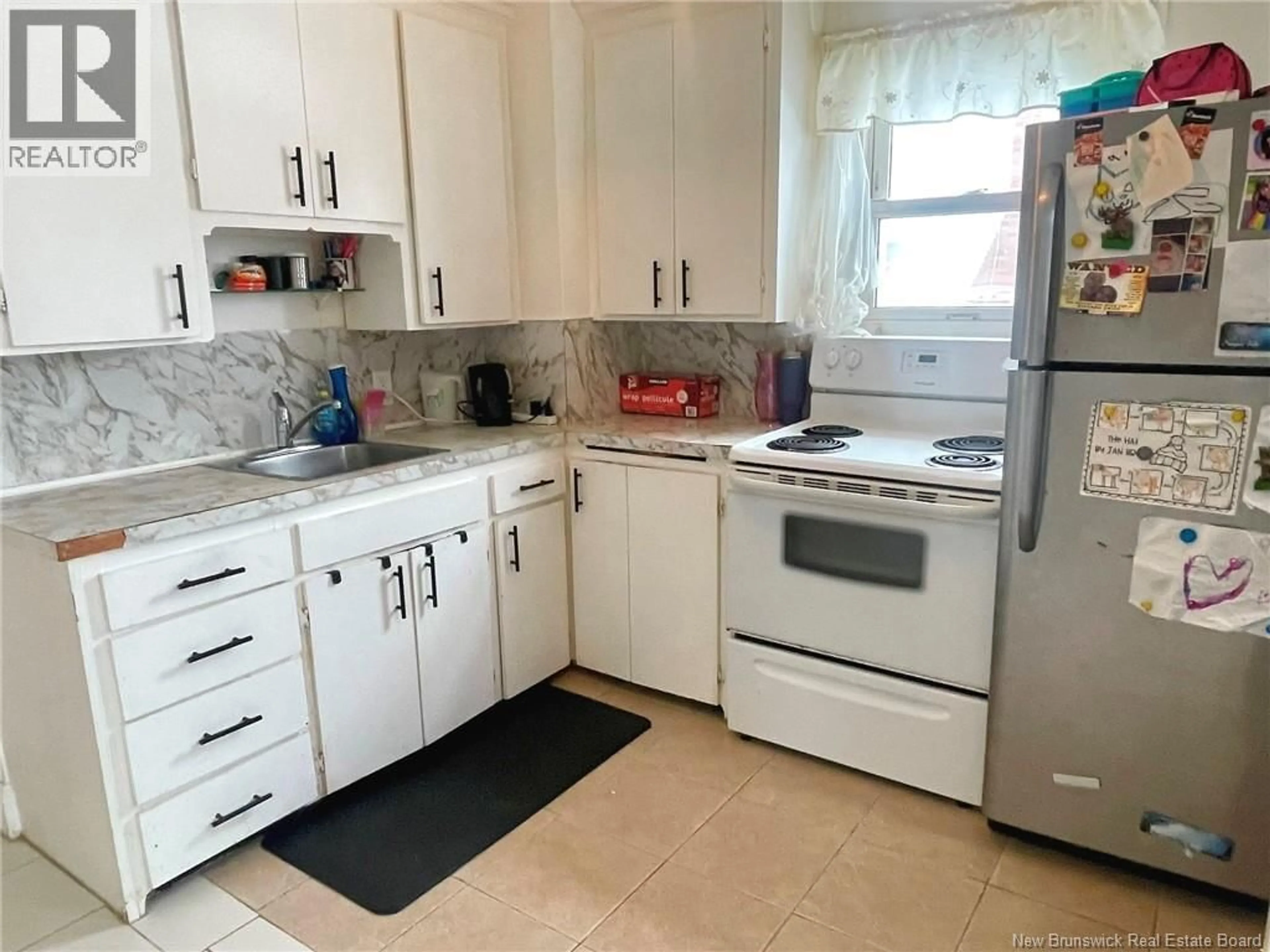 Standard kitchen, ceramic/tile floor for 46 NORTH STREET, Moncton New Brunswick E1C5X6