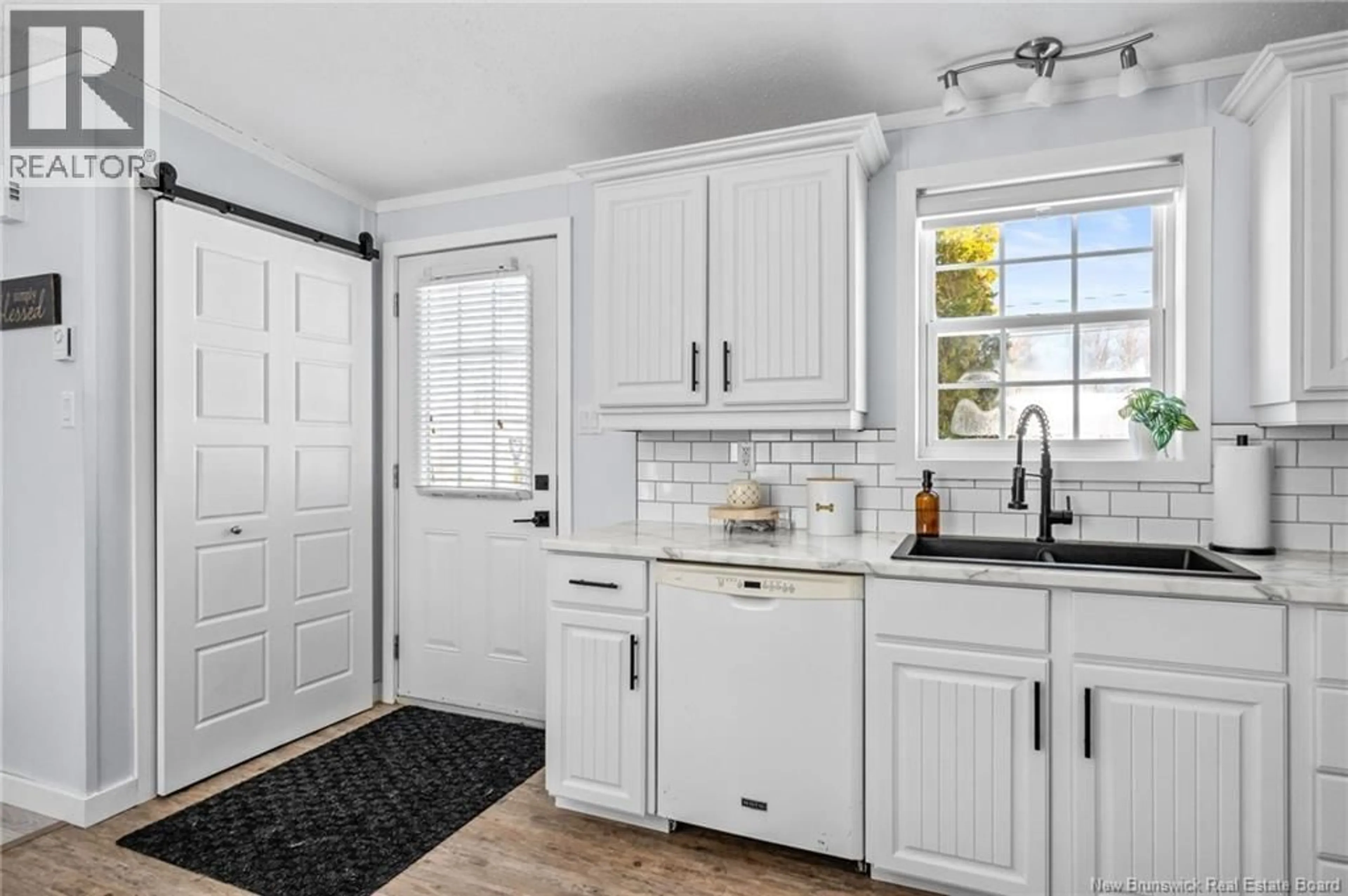 Open concept kitchen, ceramic/tile floor for 83 TRACADIE DRIVE, Dieppe New Brunswick E1A8P3