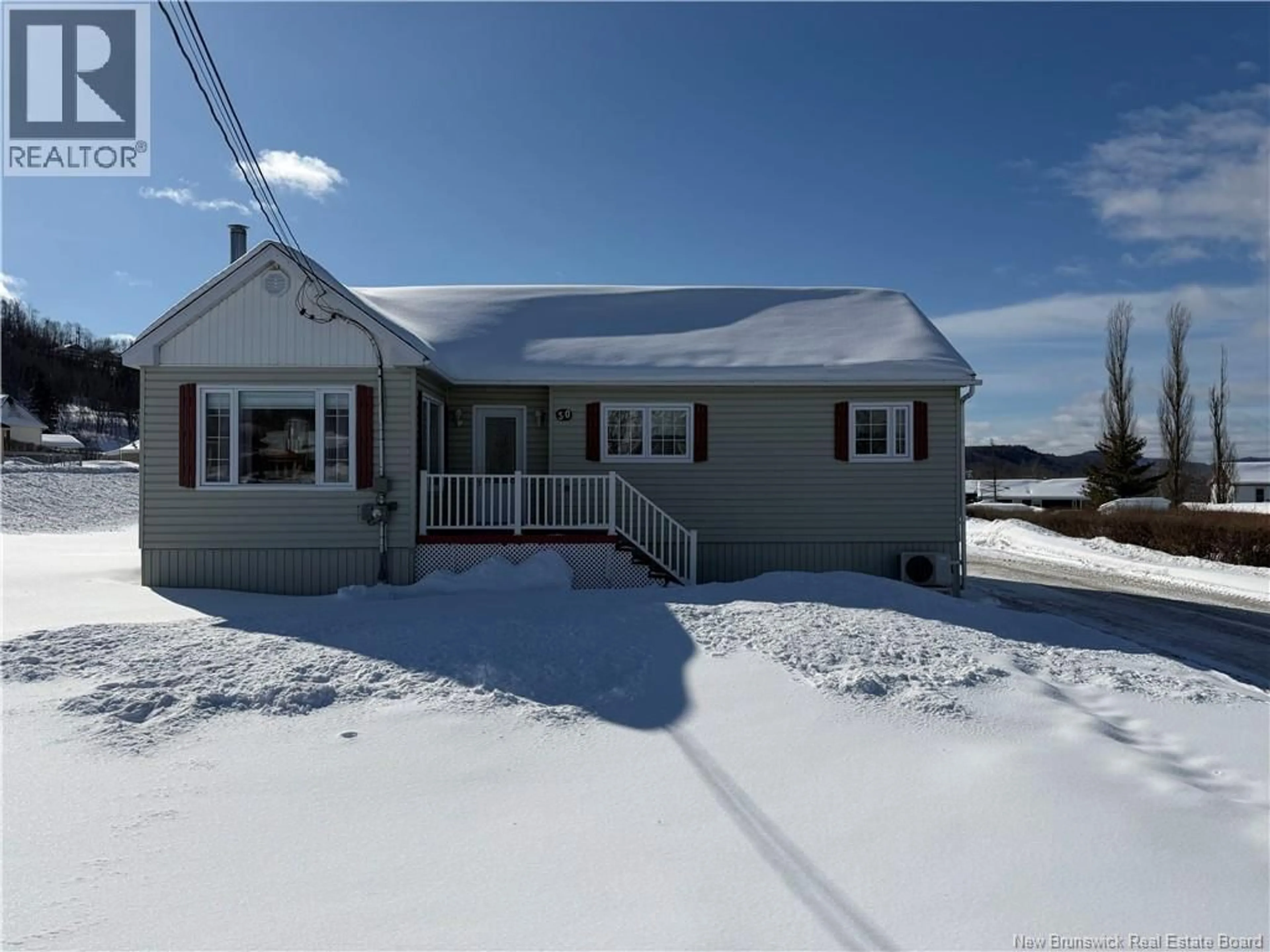Home with vinyl exterior material, street for 50 D'ANJAC STREET, Atholville New Brunswick E3N3V9