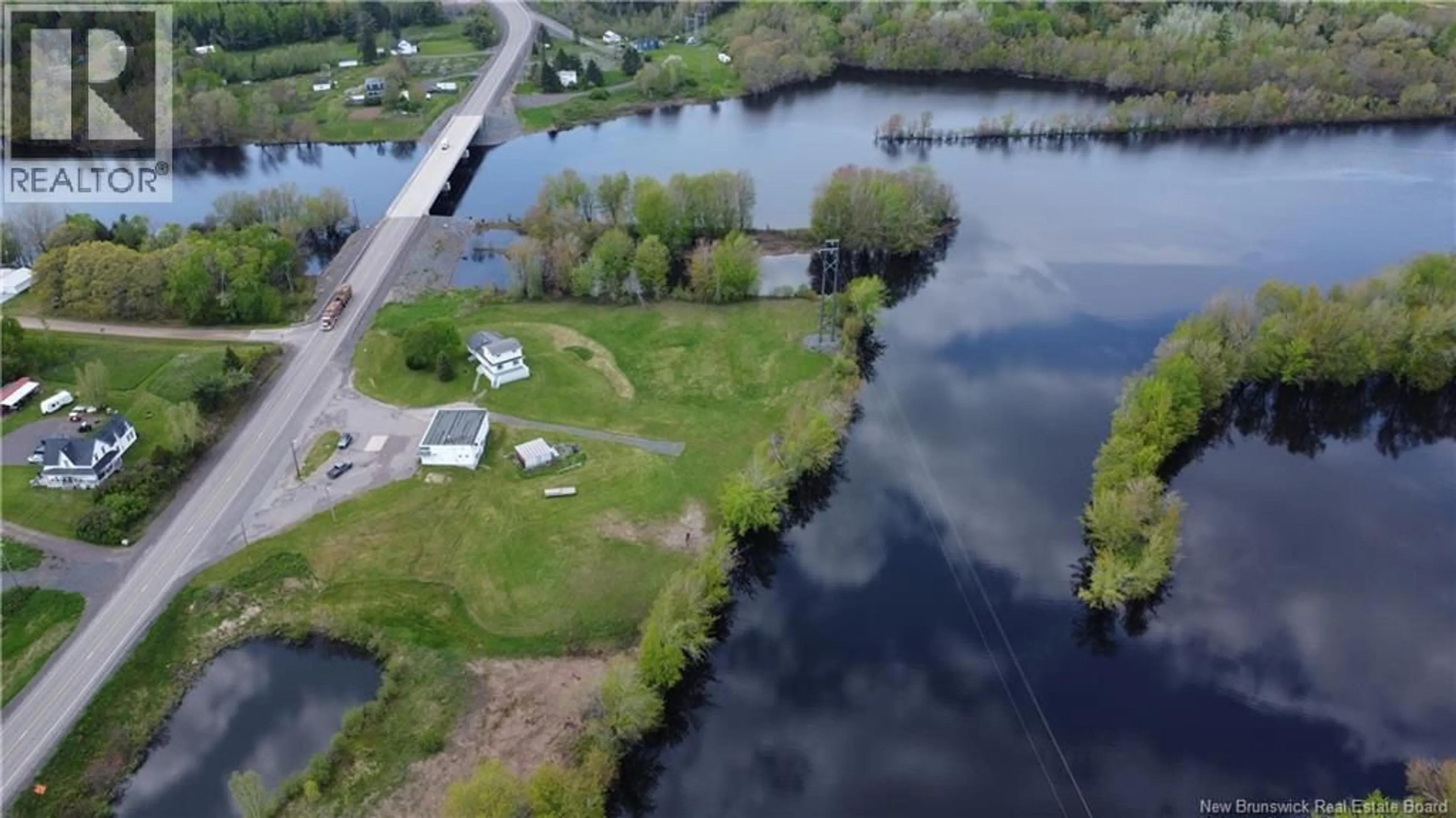 A pic from outside/outdoor area/front of a property/back of a property/a pic from drone, water/lake/river/ocean view for 11369 ROUTE 10, Coles Island New Brunswick E4C2T8