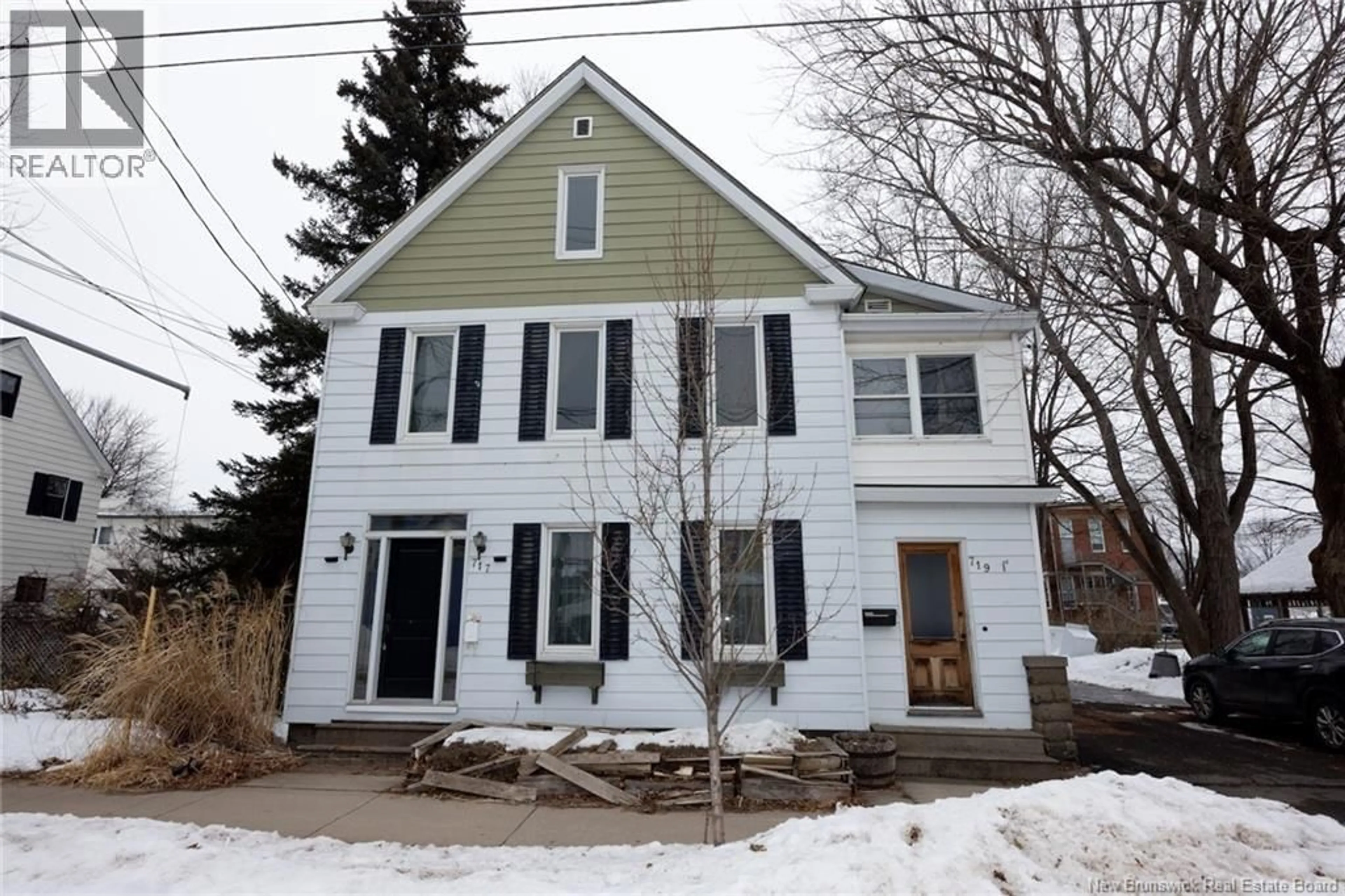 Home with vinyl exterior material, street for 717-721 CHURCHILL ROW, Fredericton New Brunswick E3B1B7