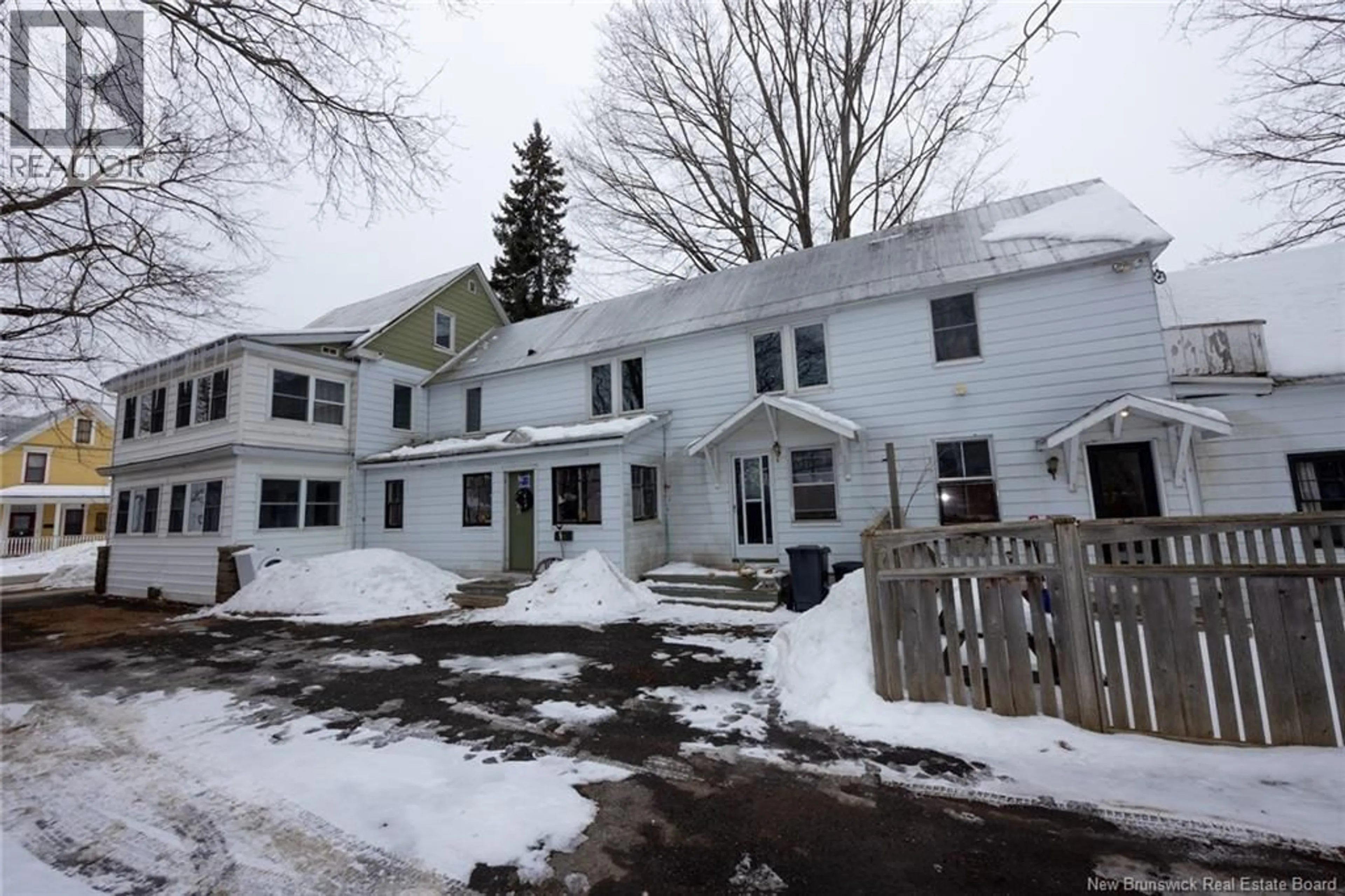 A pic from outside/outdoor area/front of a property/back of a property/a pic from drone, building for 717-721 CHURCHILL ROW, Fredericton New Brunswick E3B1B7