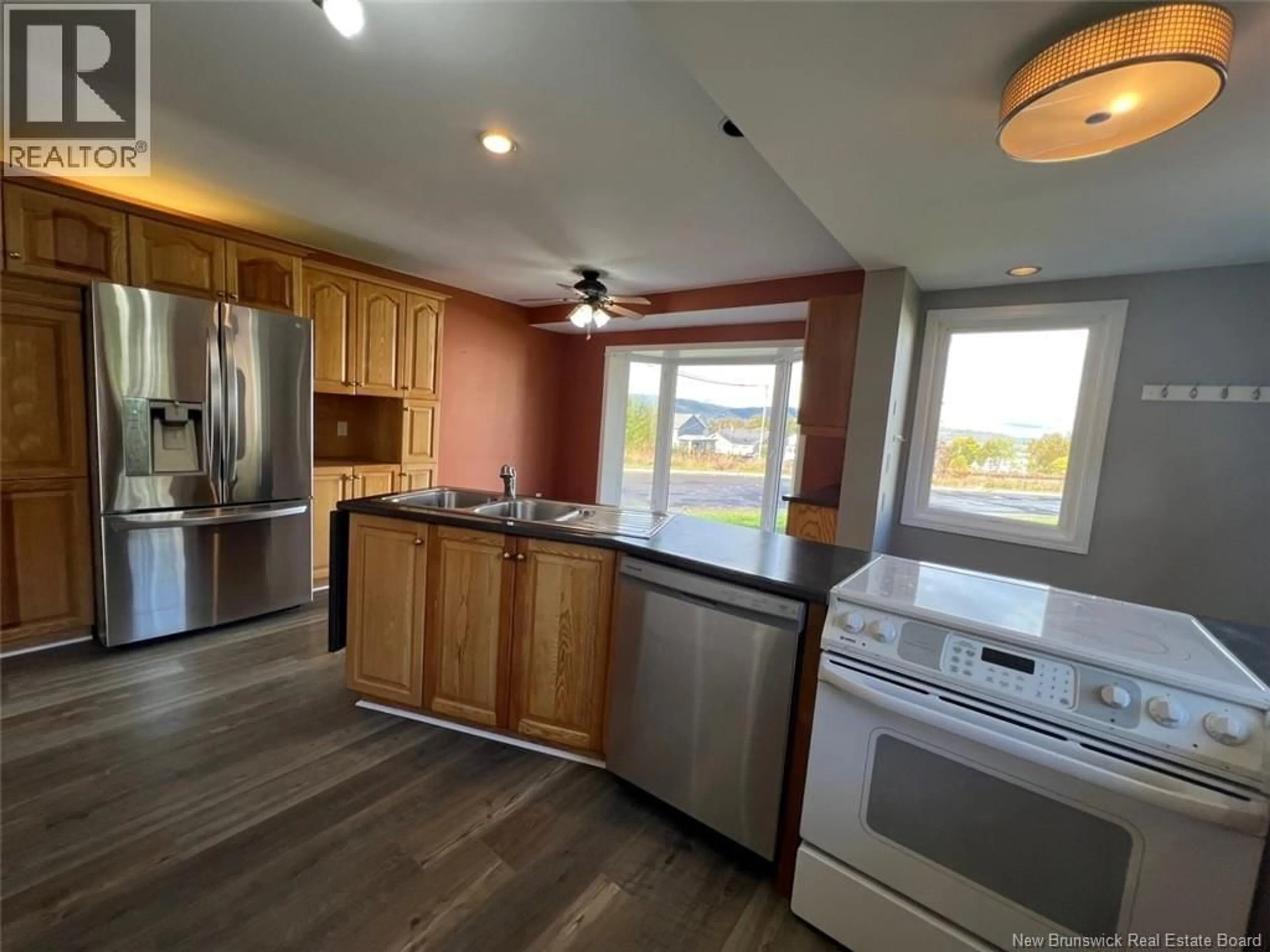 Open concept kitchen, wood/laminate floor for 22 PRINCE WILLIAM STREET, Campbellton New Brunswick E3N1X6