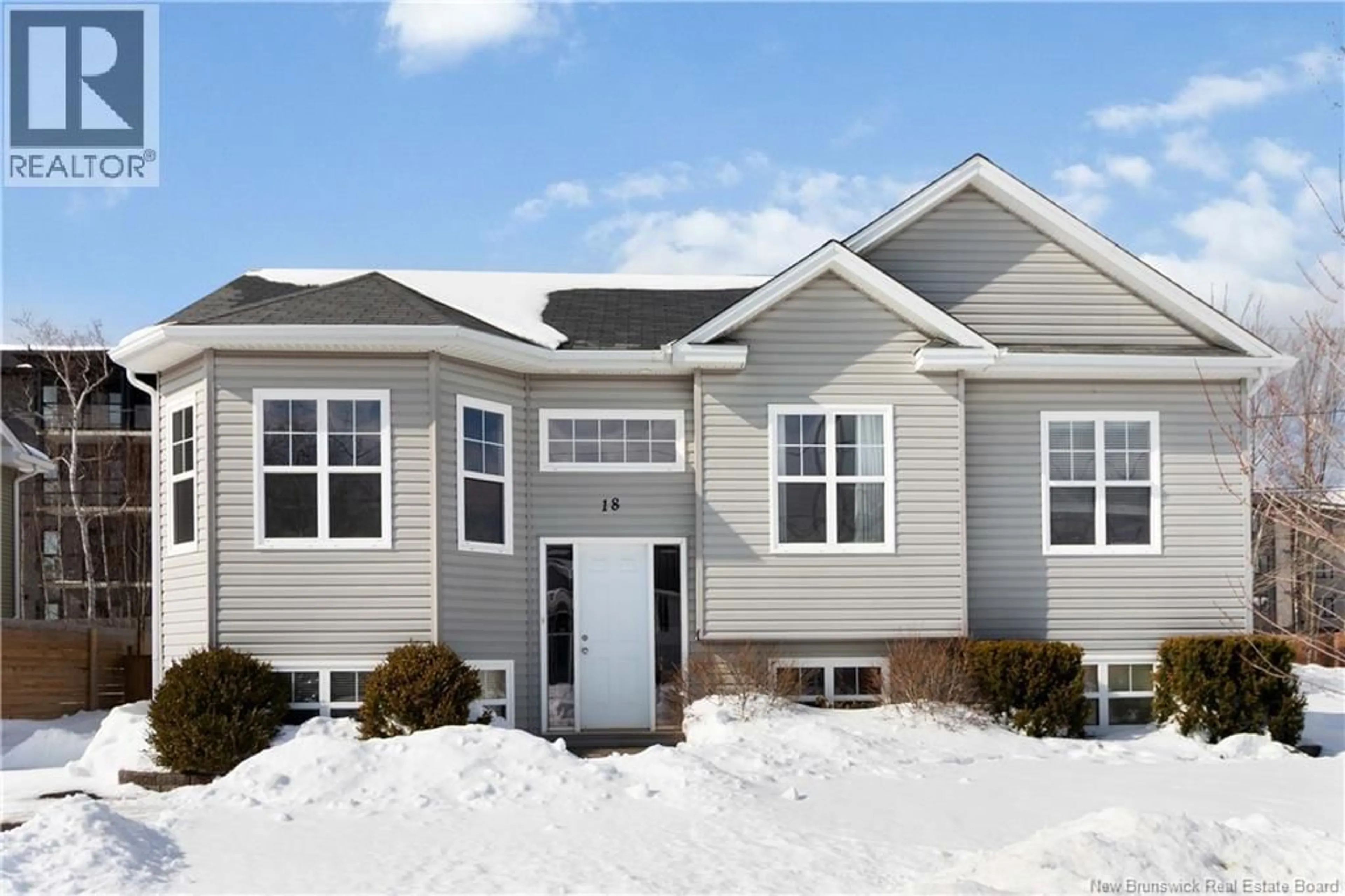 Home with vinyl exterior material, street for 18 MCCOY, Moncton New Brunswick E1G0K6