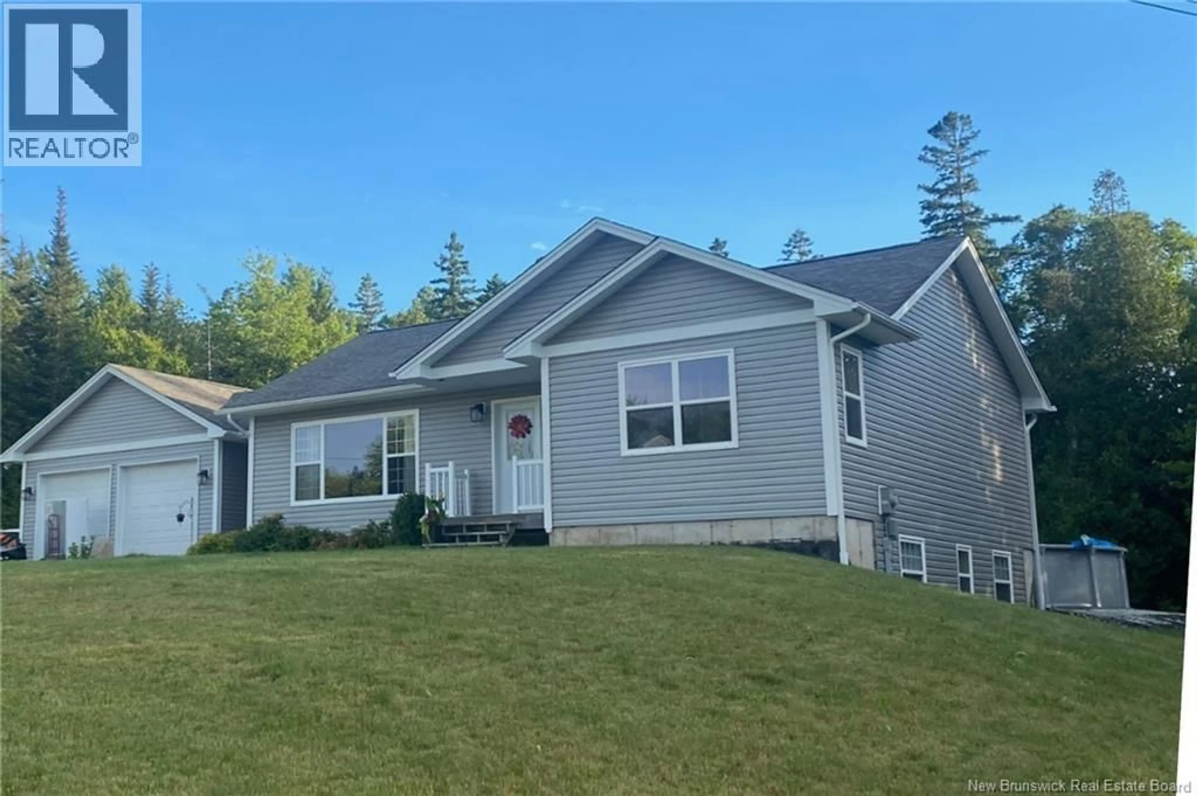 Home with vinyl exterior material, street for 44 SAXON DRIVE, Quispamsis New Brunswick E2G0E3