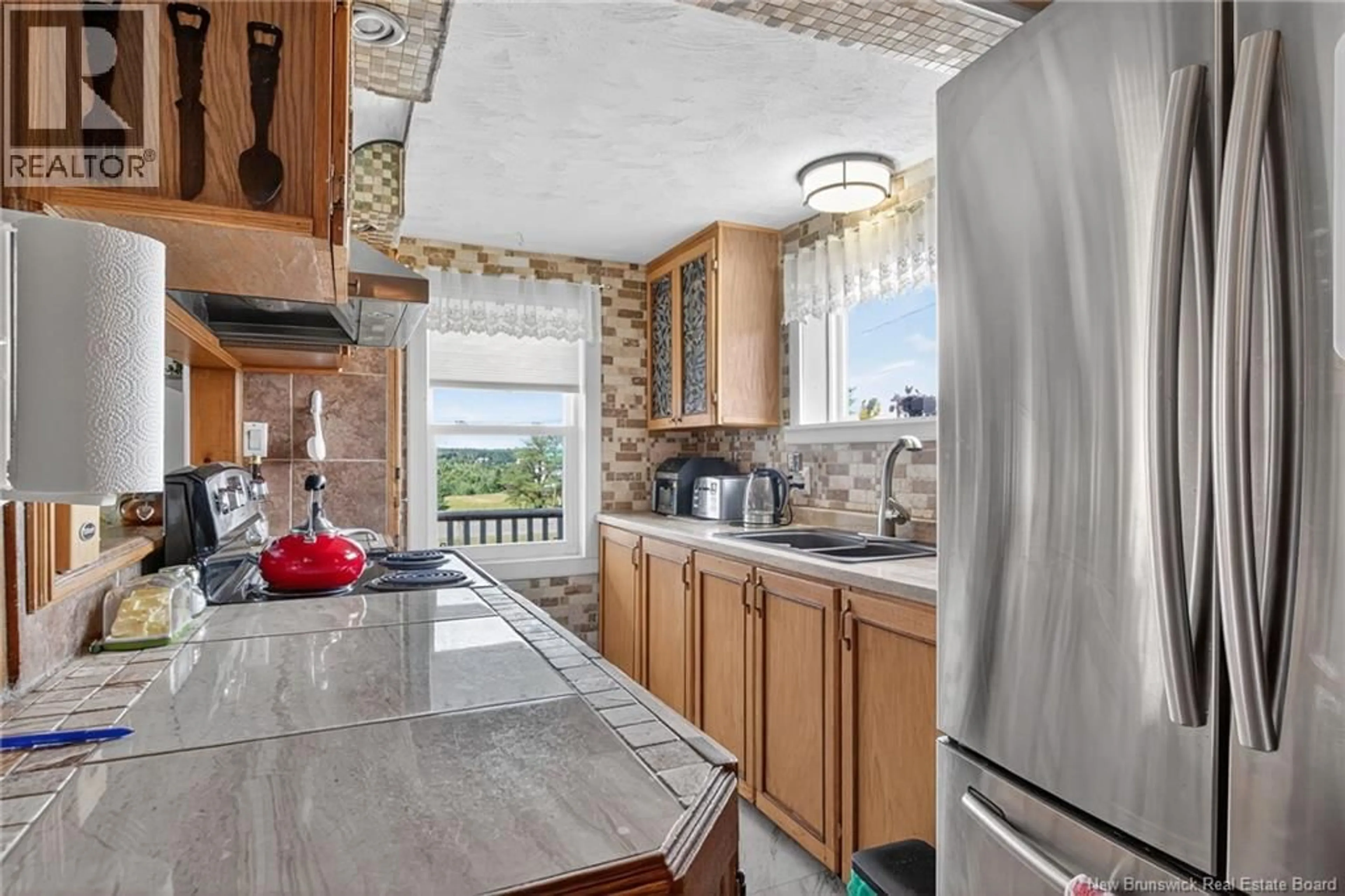 Open concept kitchen, ceramic/tile floor for 1677 SAINT IGNACE STREET, Saint-Ignace New Brunswick E4X2H3