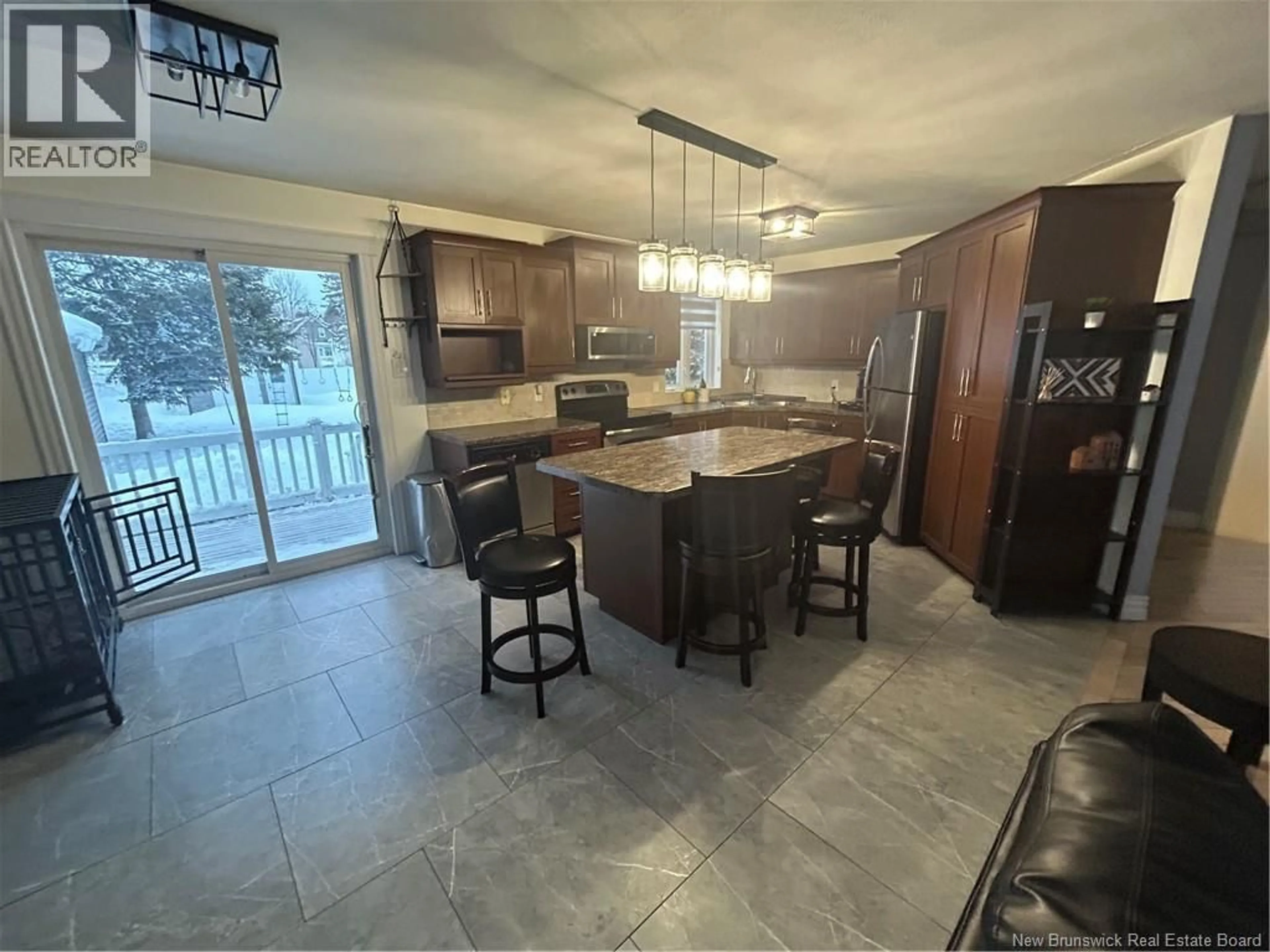 Open concept kitchen, ceramic/tile floor for 505 RUE BREAU, Tracadie New Brunswick E1X1E3